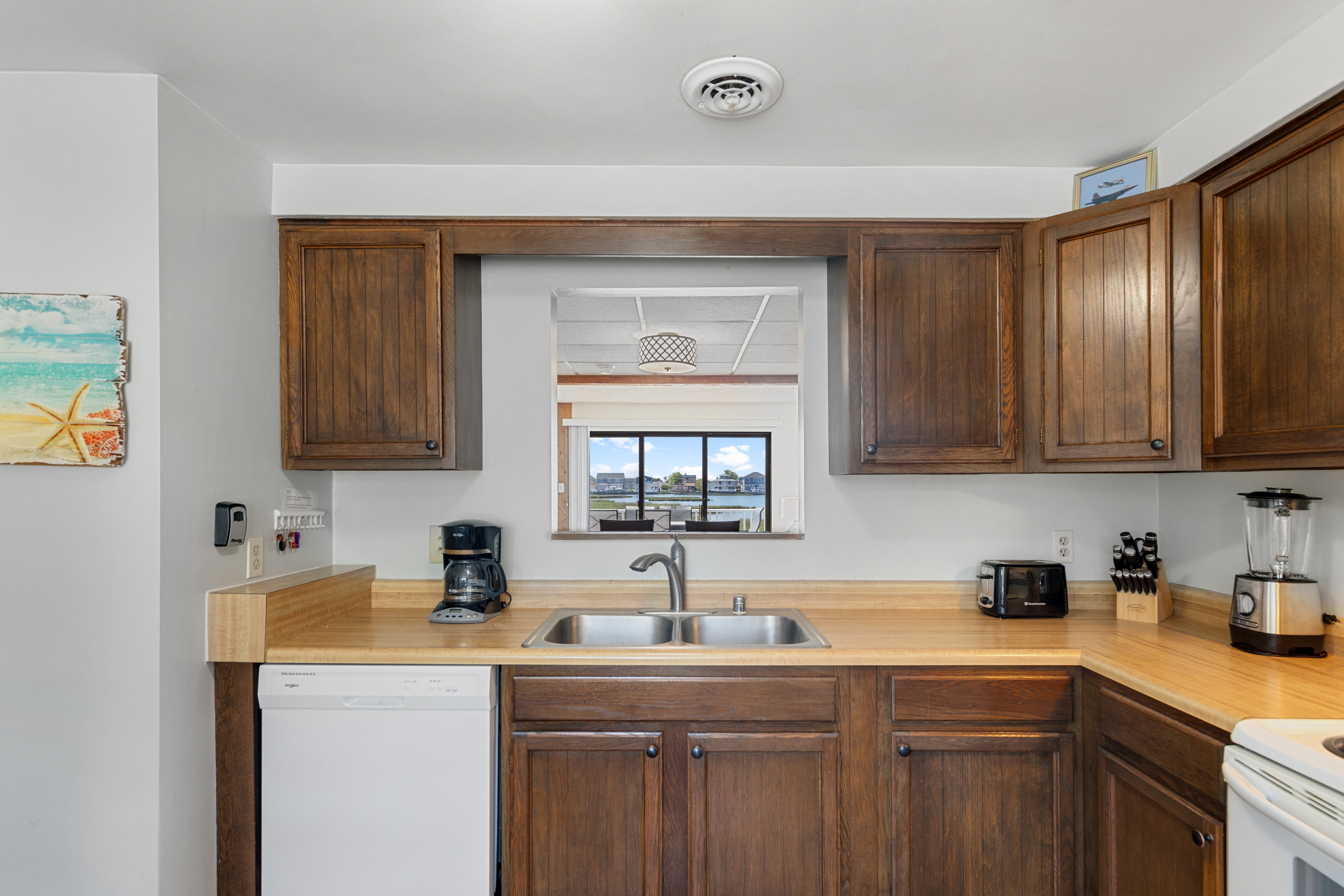 The chef in your family won't ever feel left out with the cut out to the main living area