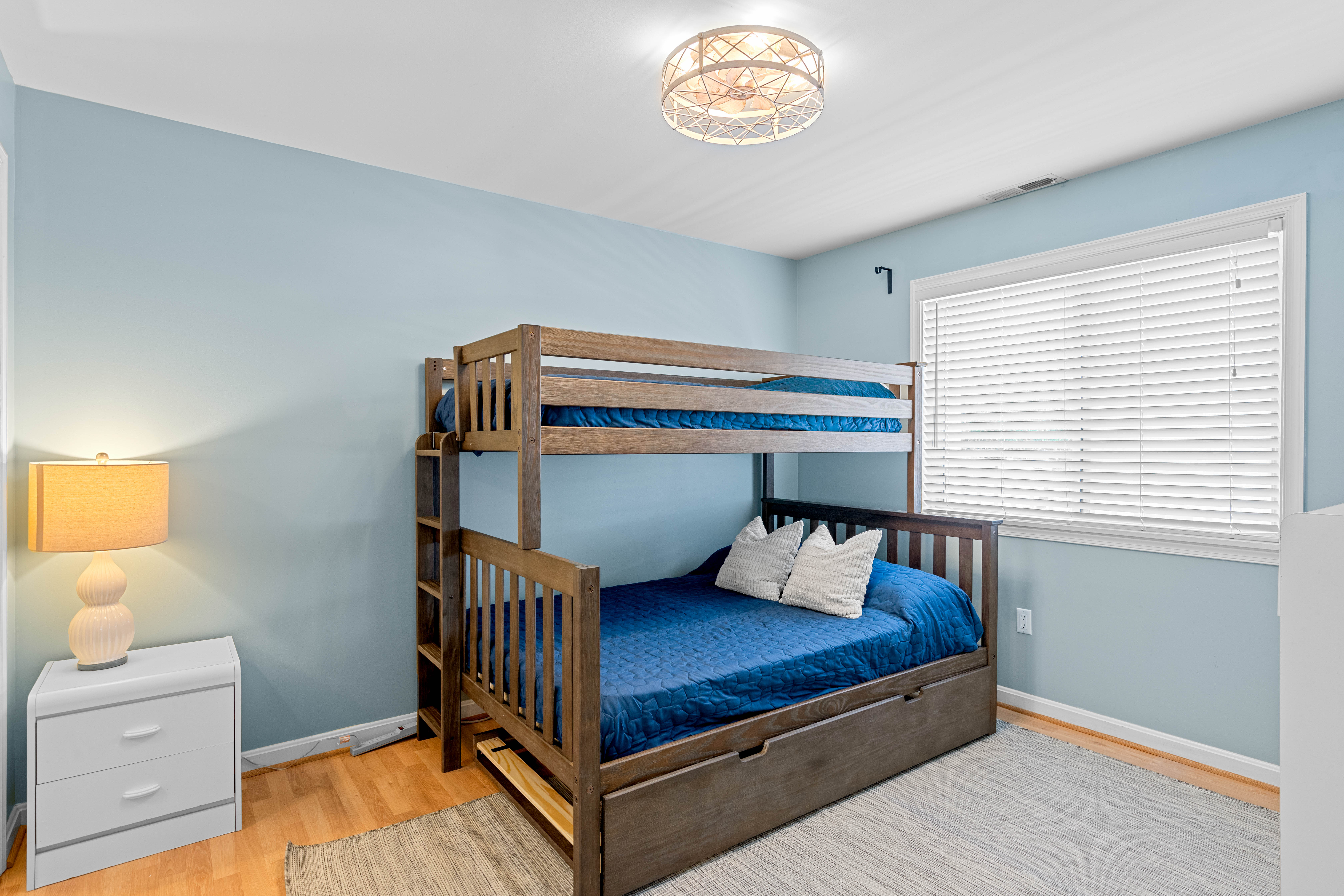 Bedroom 2 has a pyramid bunk with a twin over a full