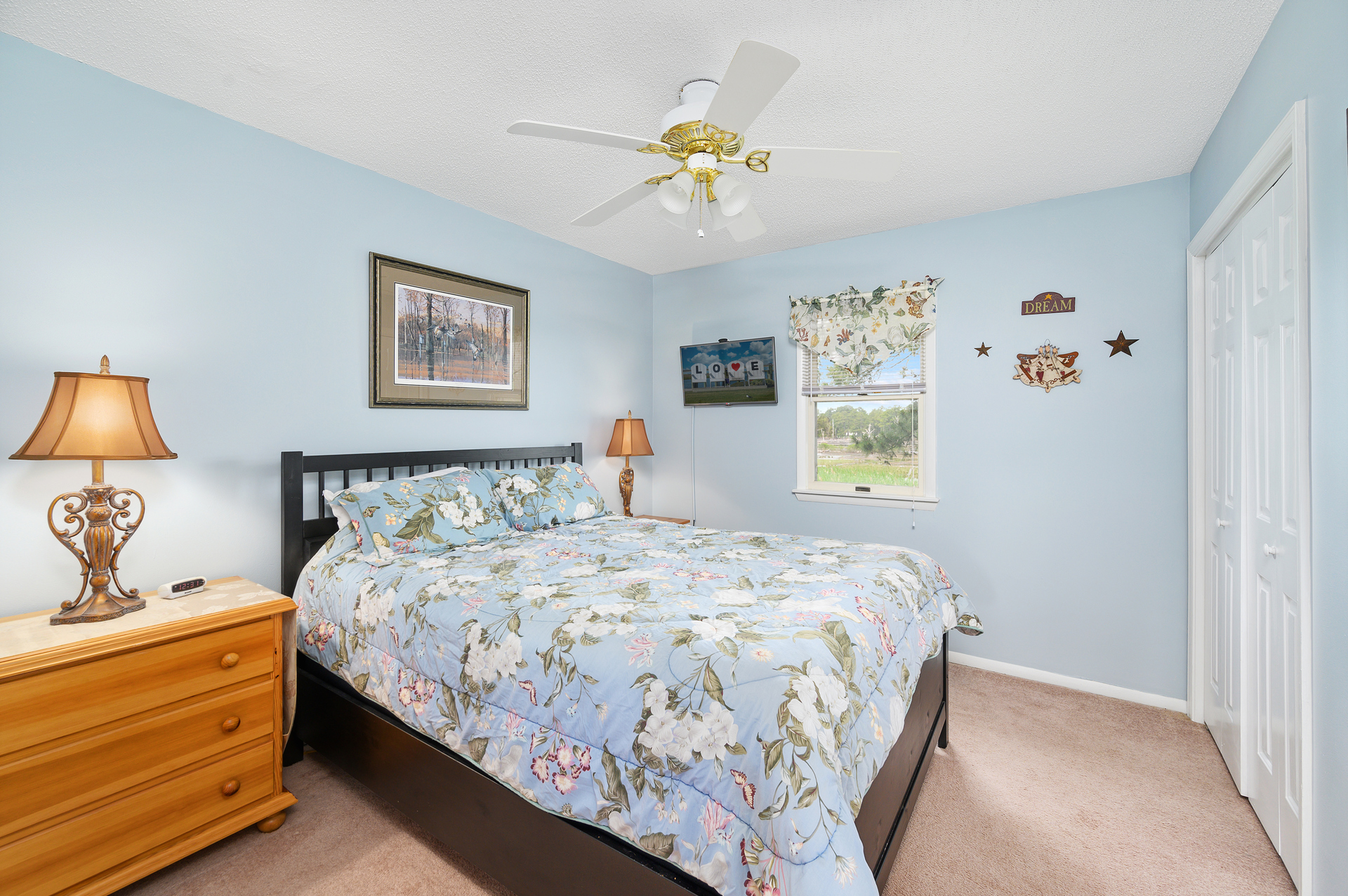 Wandering upstairs, Bedroom 2 has a comfy Queen Bed.