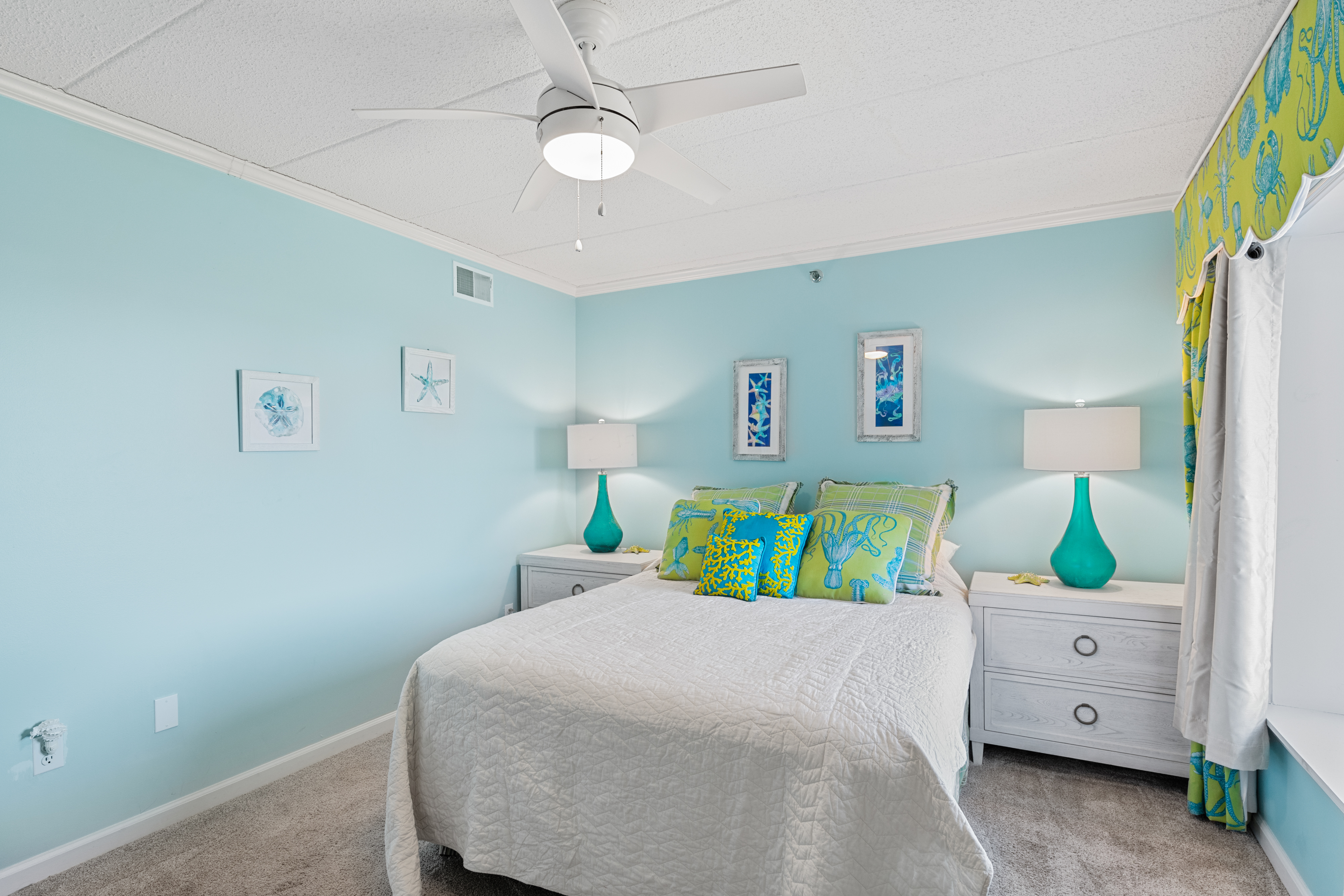 Bedroom 2 features a Queen Bed.
