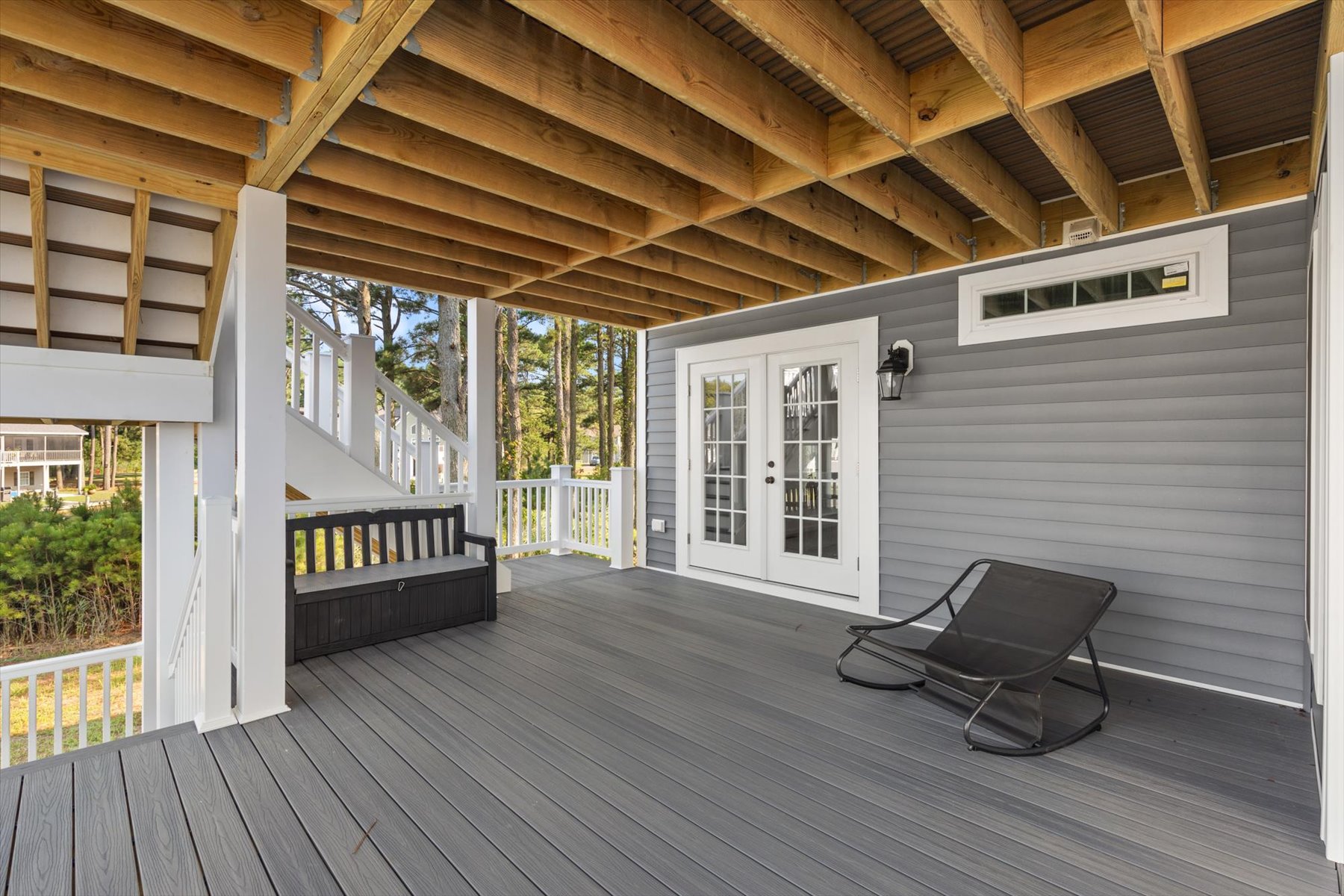 The Shaded Deck on the lower level has multiple seating options.