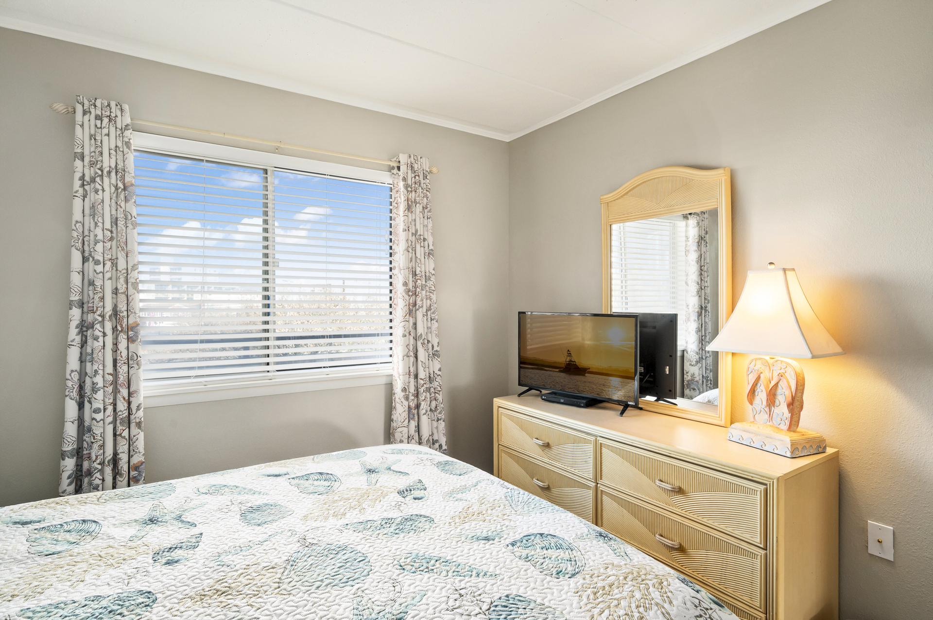 This Bedroom offers a Plush Queen Bed and Flat Screen Smart TV.