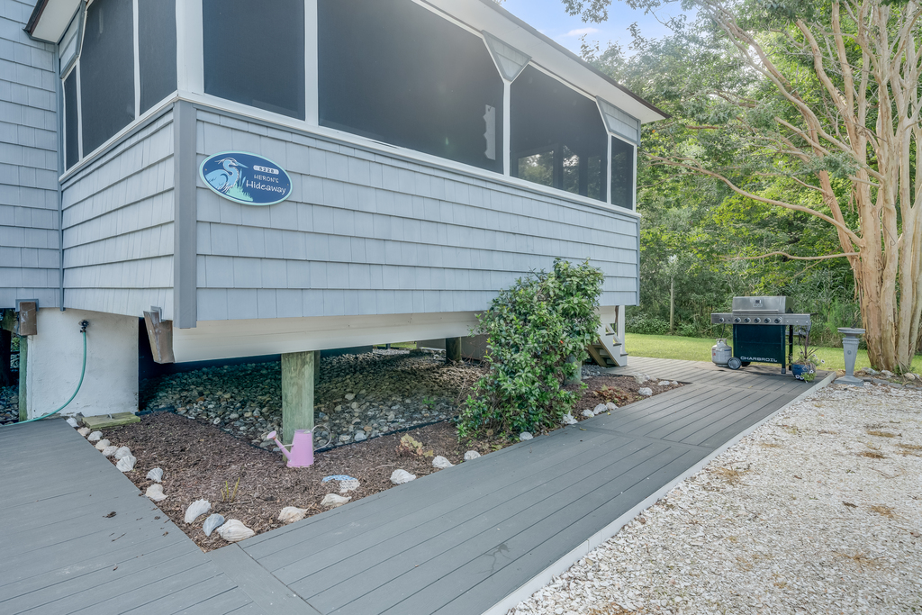 Beautifully landscaped yard leads to Patio with Grill.
