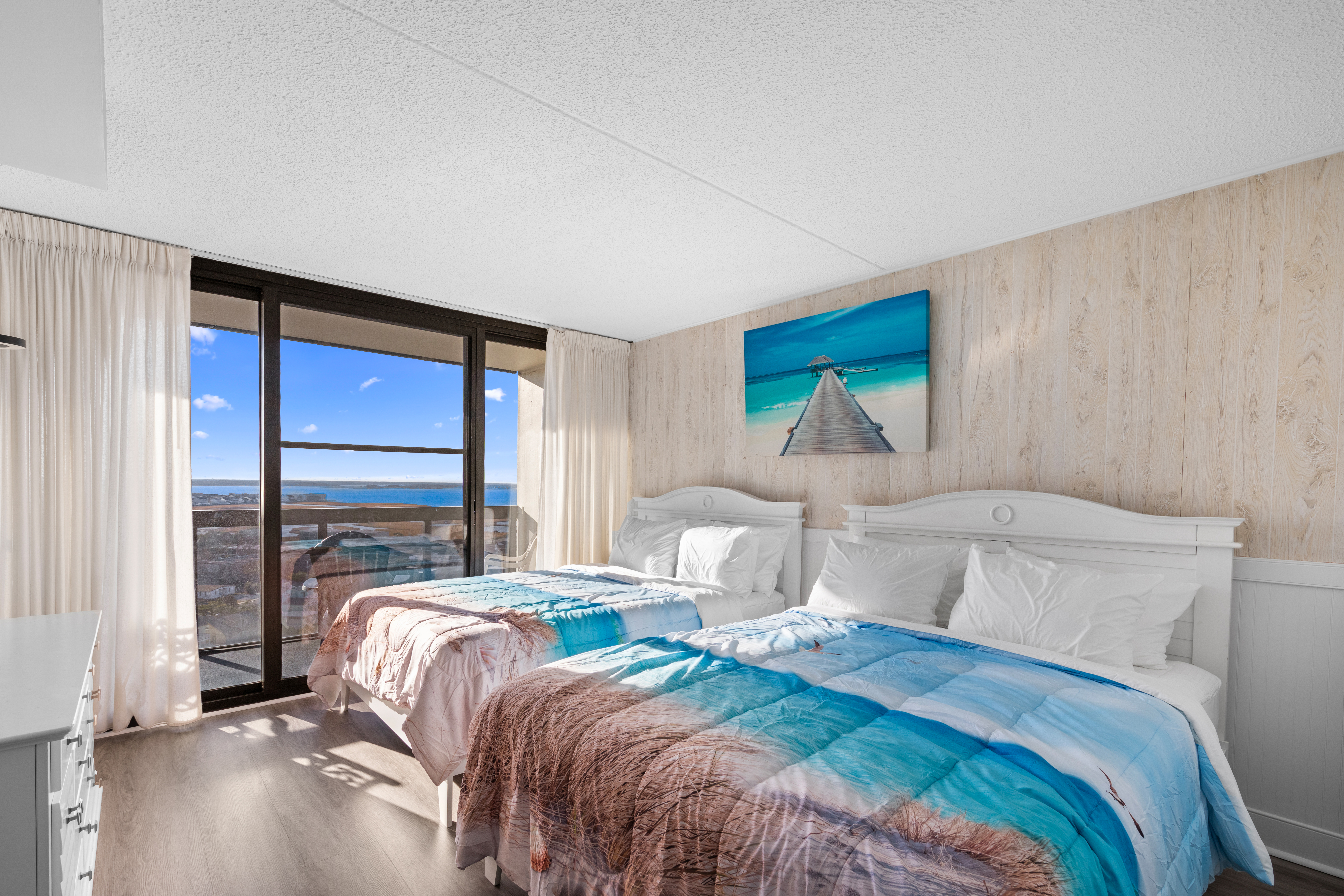 Bedroom 2 features city and bay views.