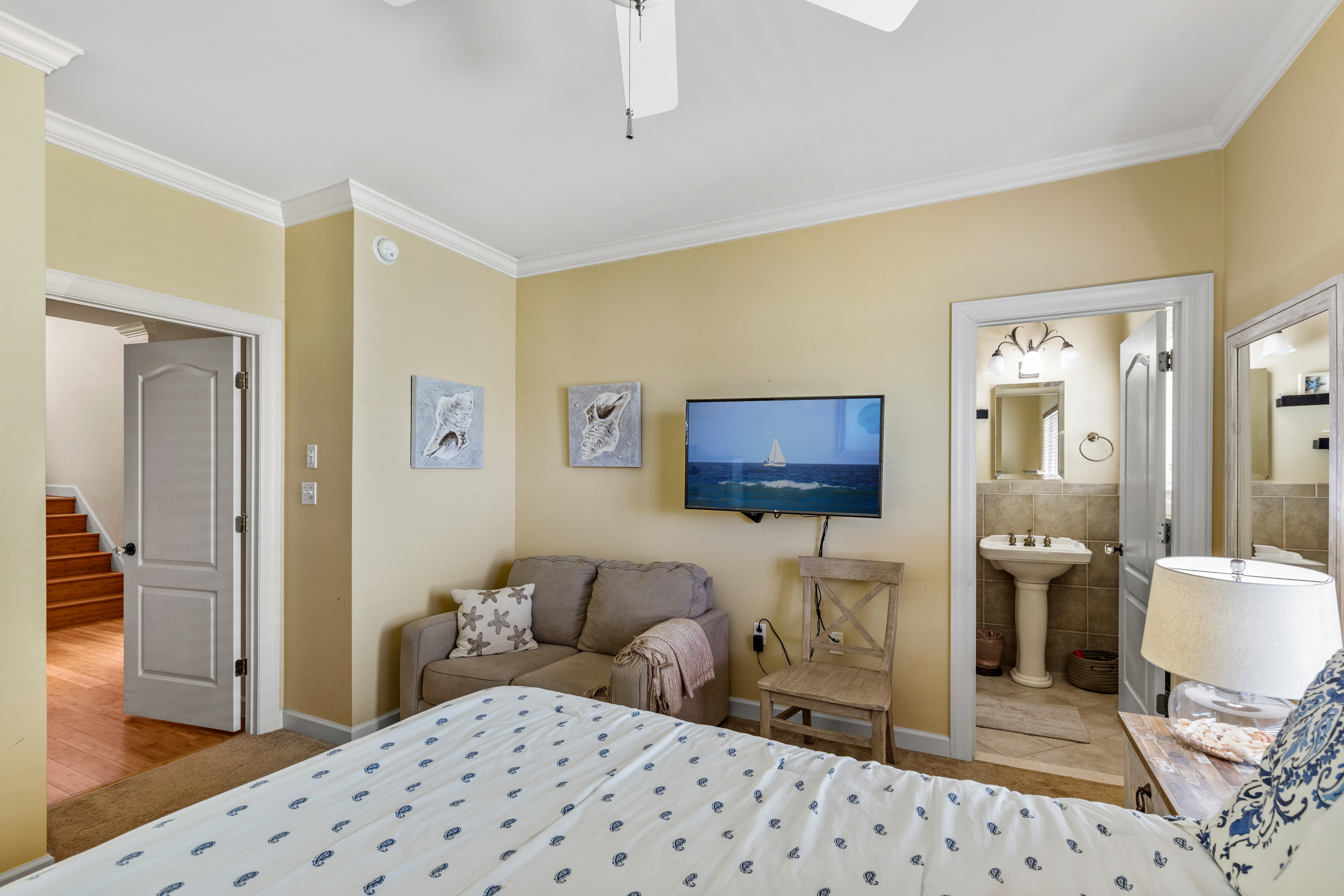 Enjoy the Flat Screen TV and attached Bath.