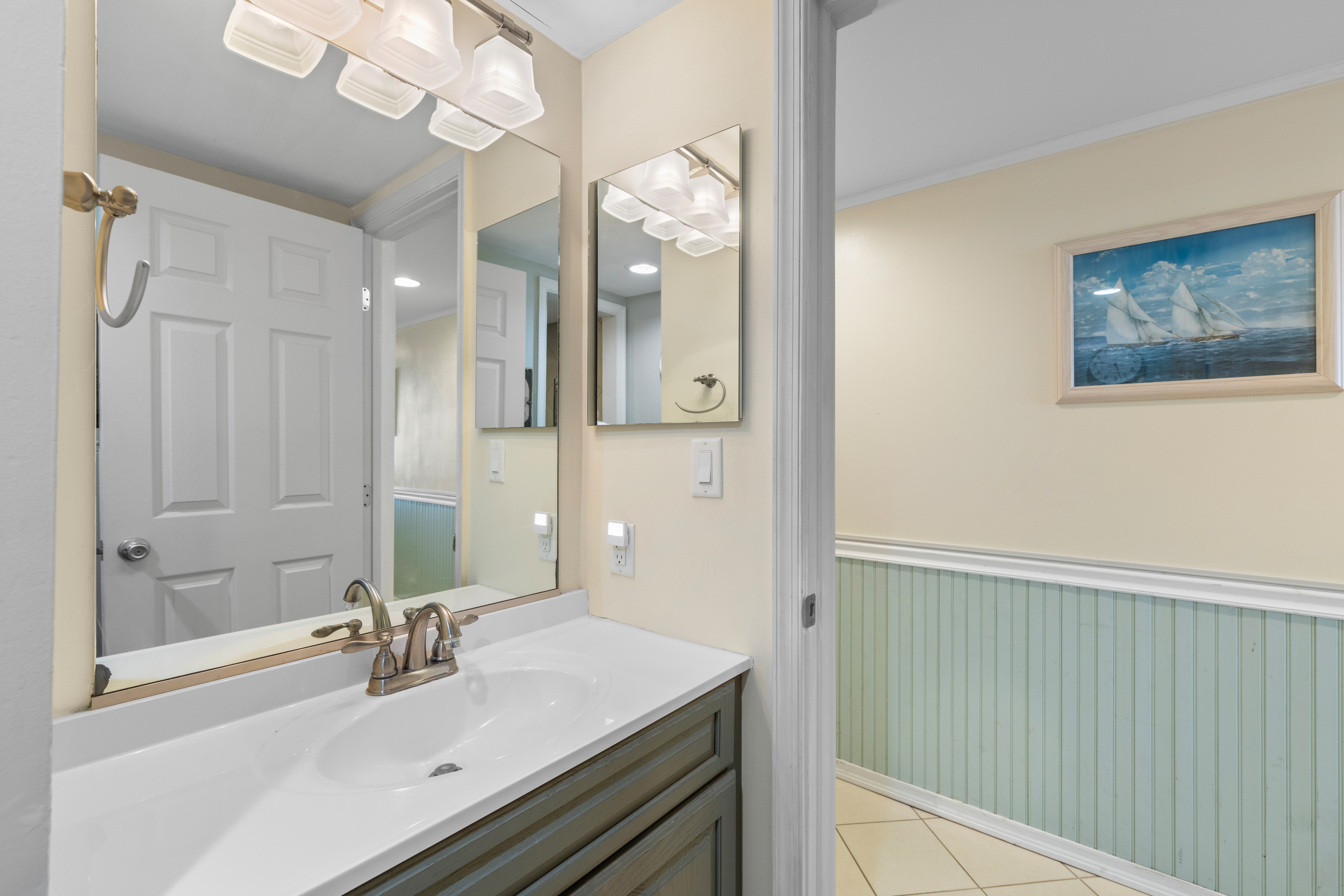 As you enter, you'll find the renovated and centrally located Full Bath.