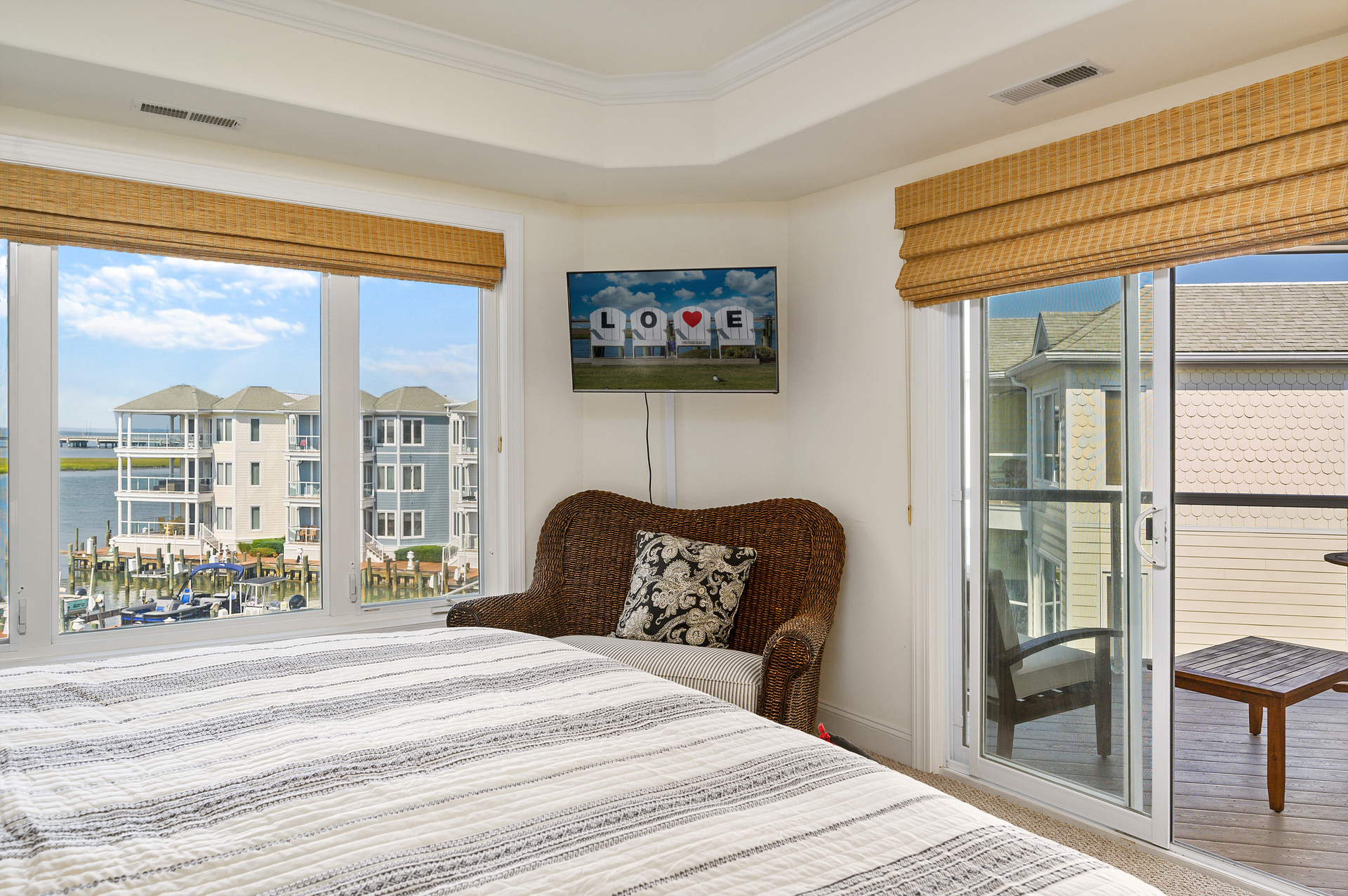 Flat Screen TV in Master and Private Access to the Waterfront Deck.