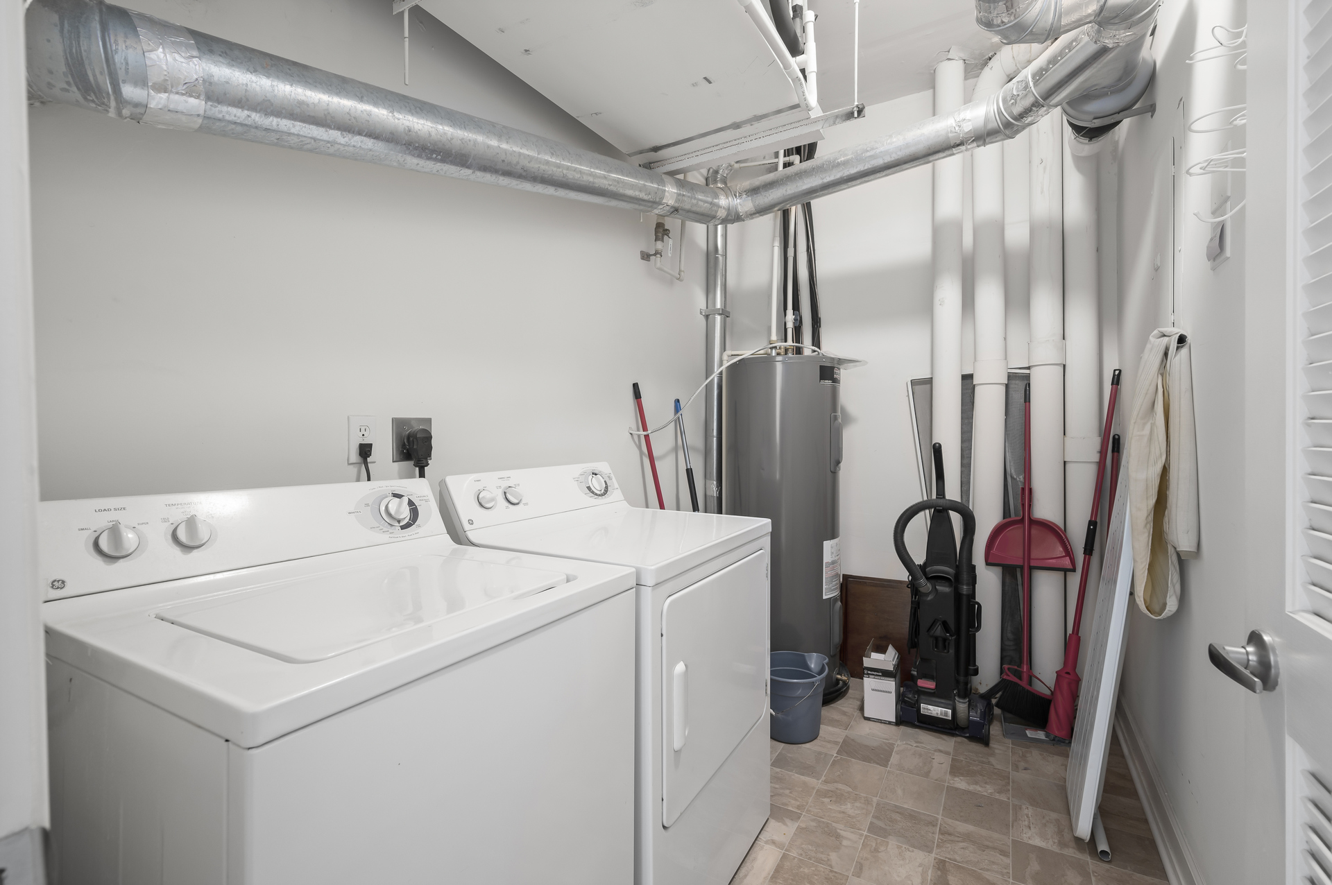 There is plenty of storage space in the large laundry room with full size washer and dryer