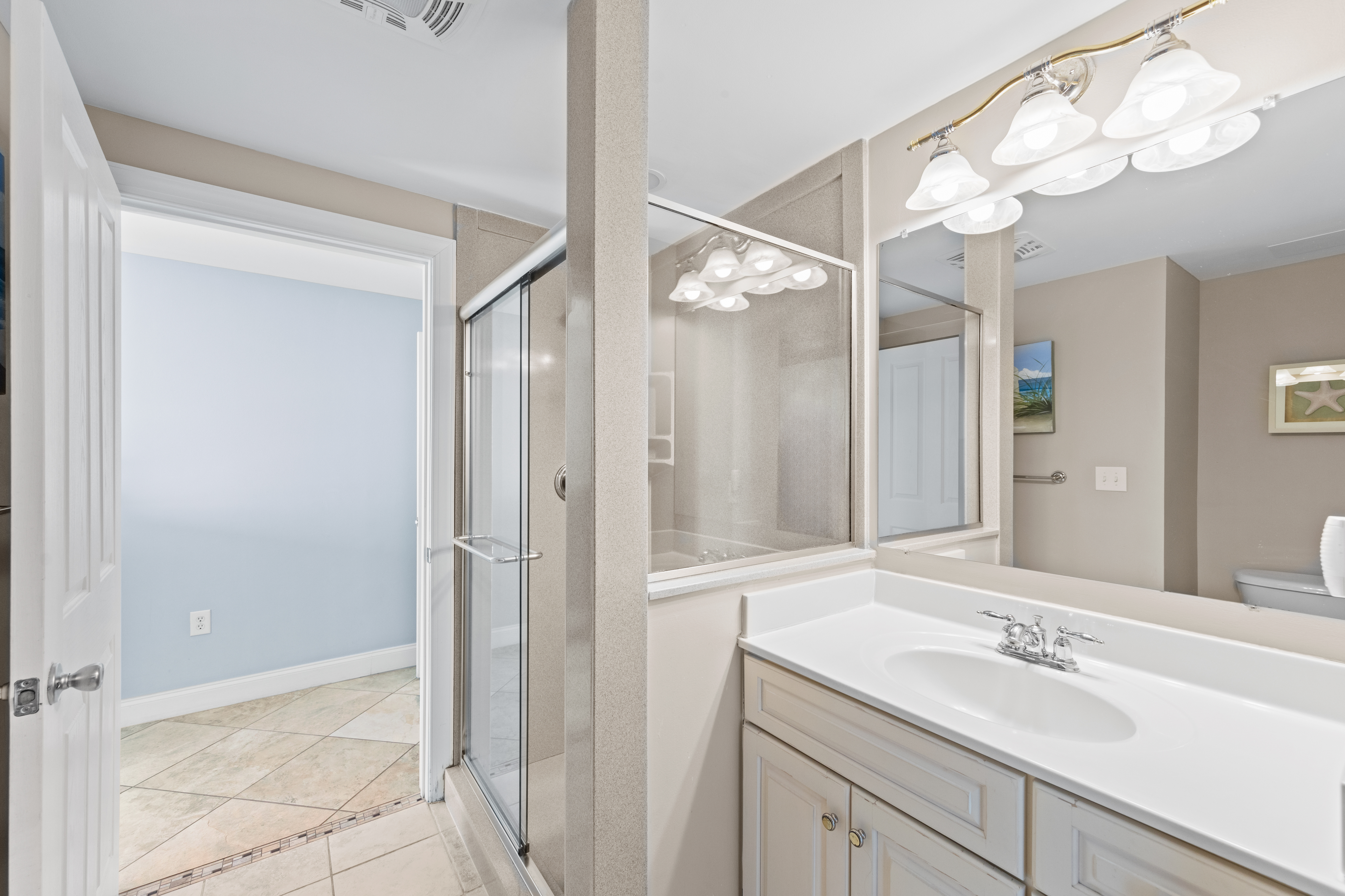 You even have access to the shared Jack and Jill Bathroom with a luxurious Custom Tile Walk-in Shower!
