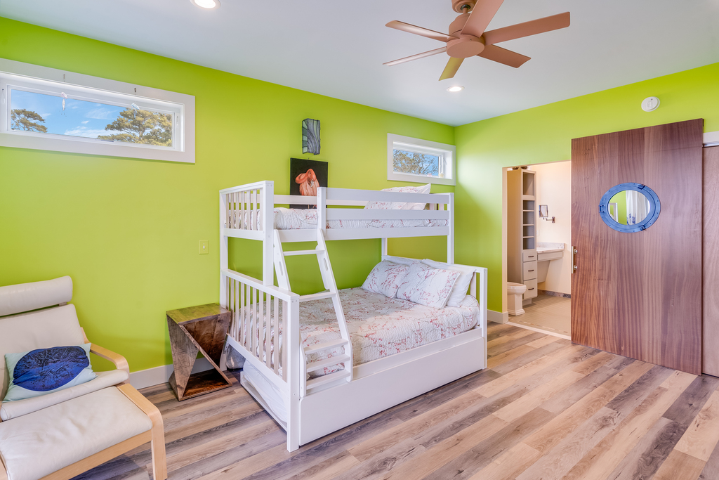 Bedroom 2 is also a 1st Floor Master with fun Key Lime vibe.