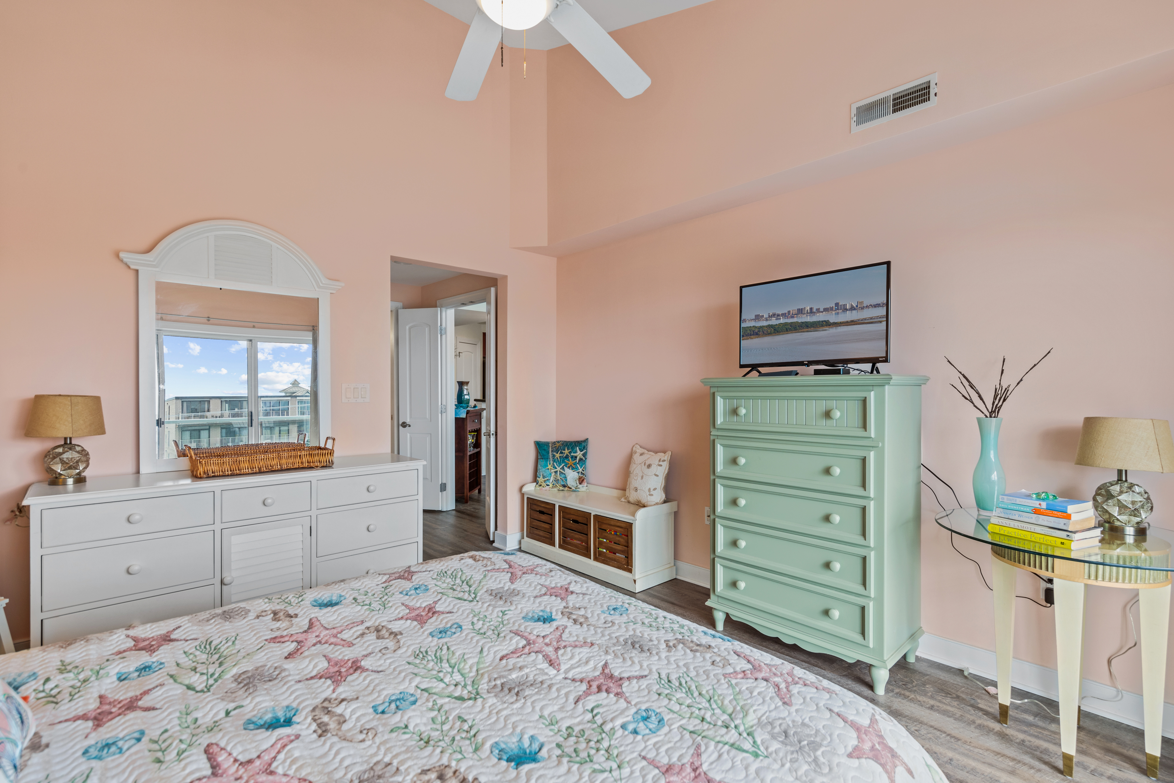 Relax in the Cool & Calming Colors throughout this Lovely Bedroom.