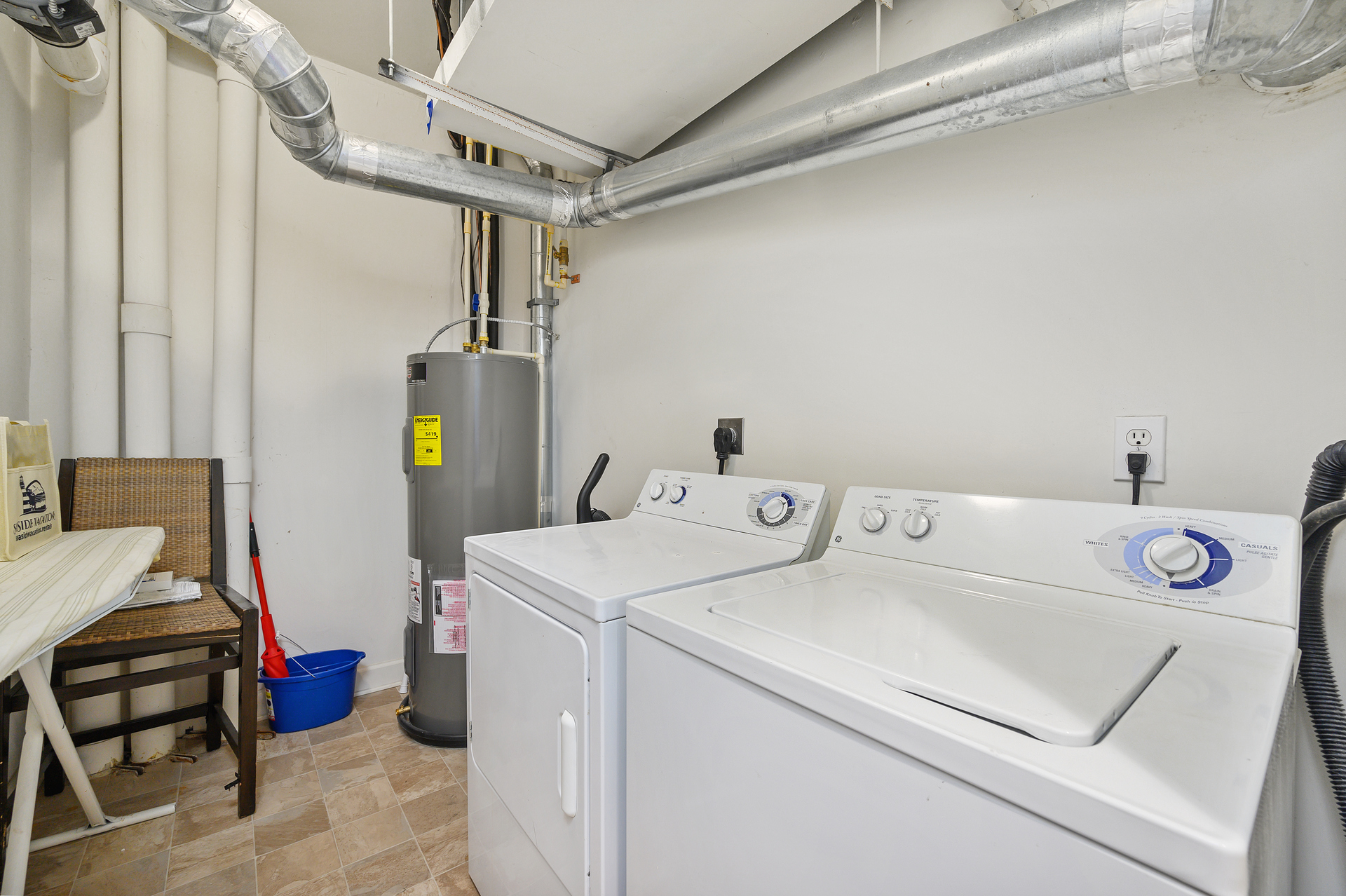 Private laundry room with full size Washer & Dryer