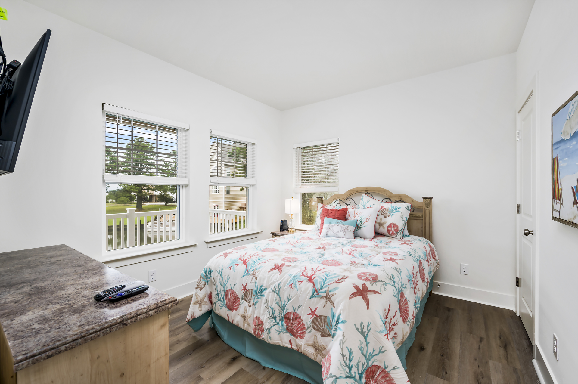 Bedroom 2 has a comfy Queen Bed and great Water Views.