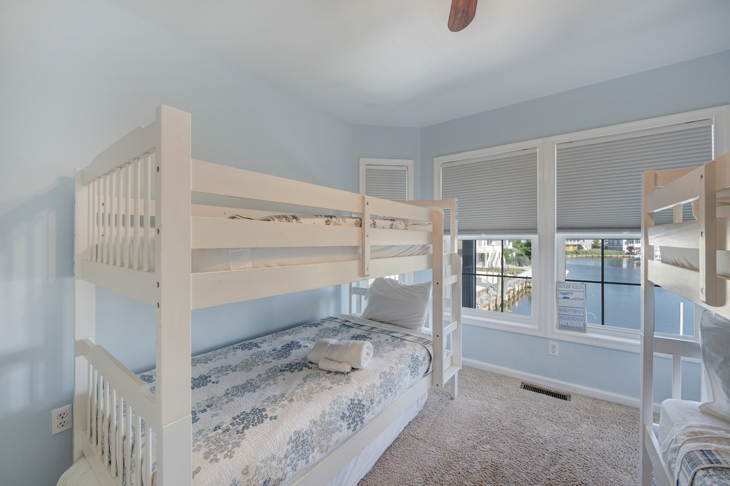 Bedroom 3 has 2 Sets of Bunkbeds, Beachy Blue Walls, and look at those Views.