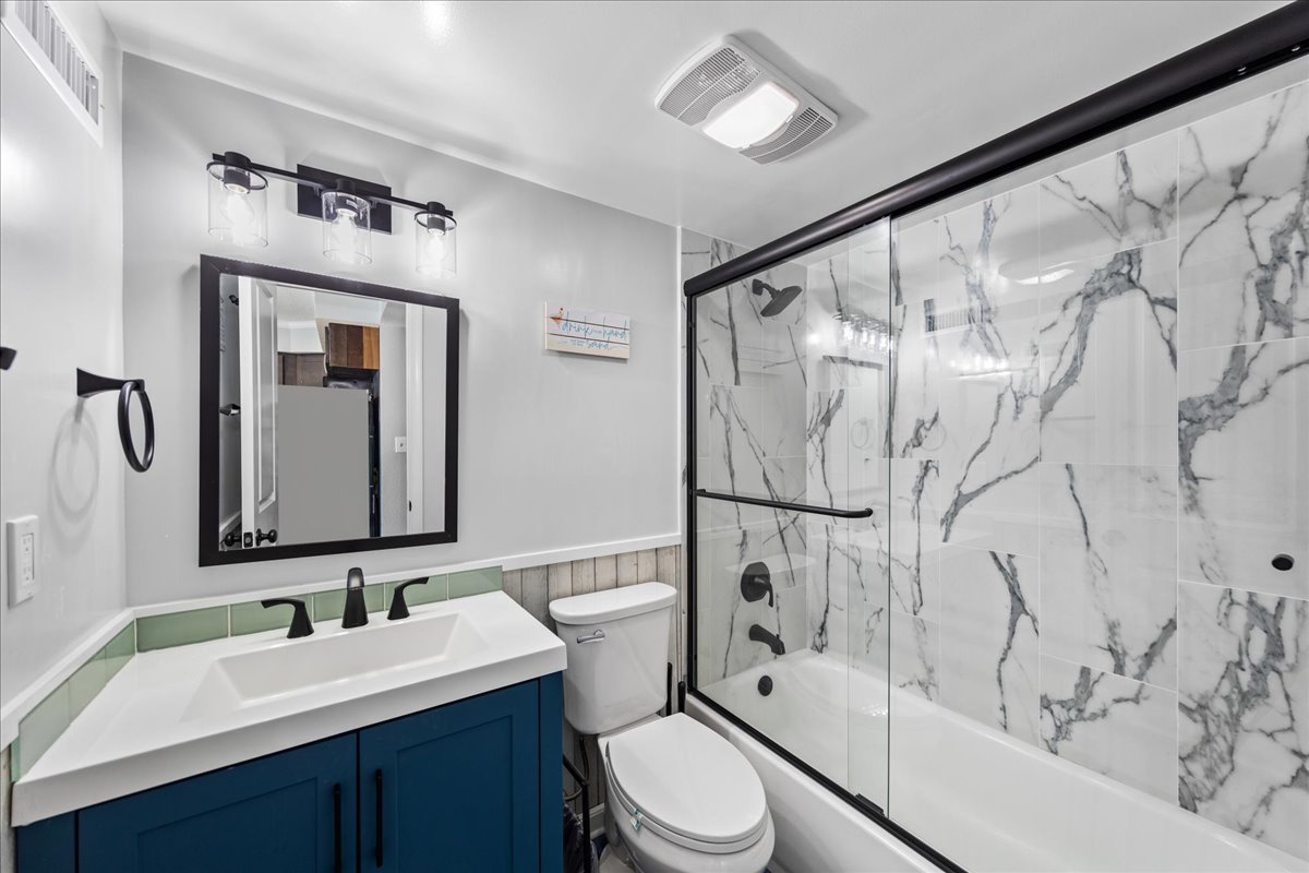 Enjoy a bubble bath in this gorgeous, newly remodeled hall bath.
