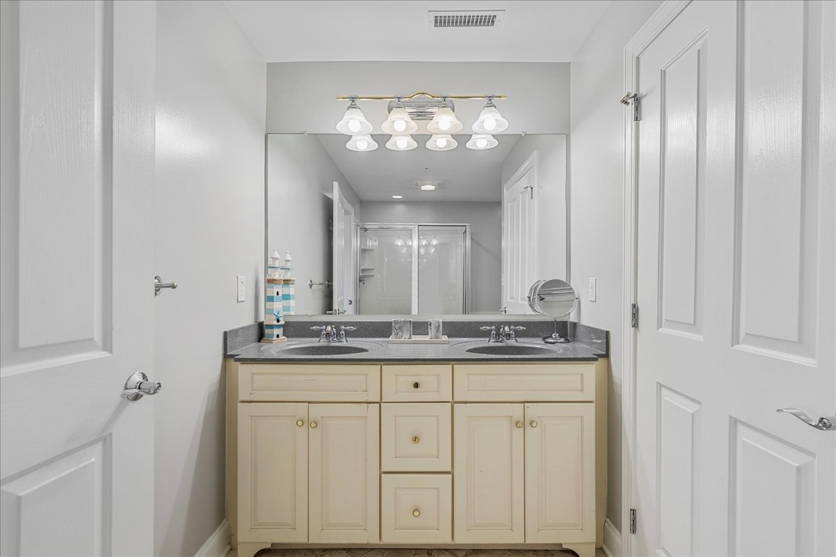 You're sure to love the Primary Bath with Double Vanity and Large Walk-In Shower.