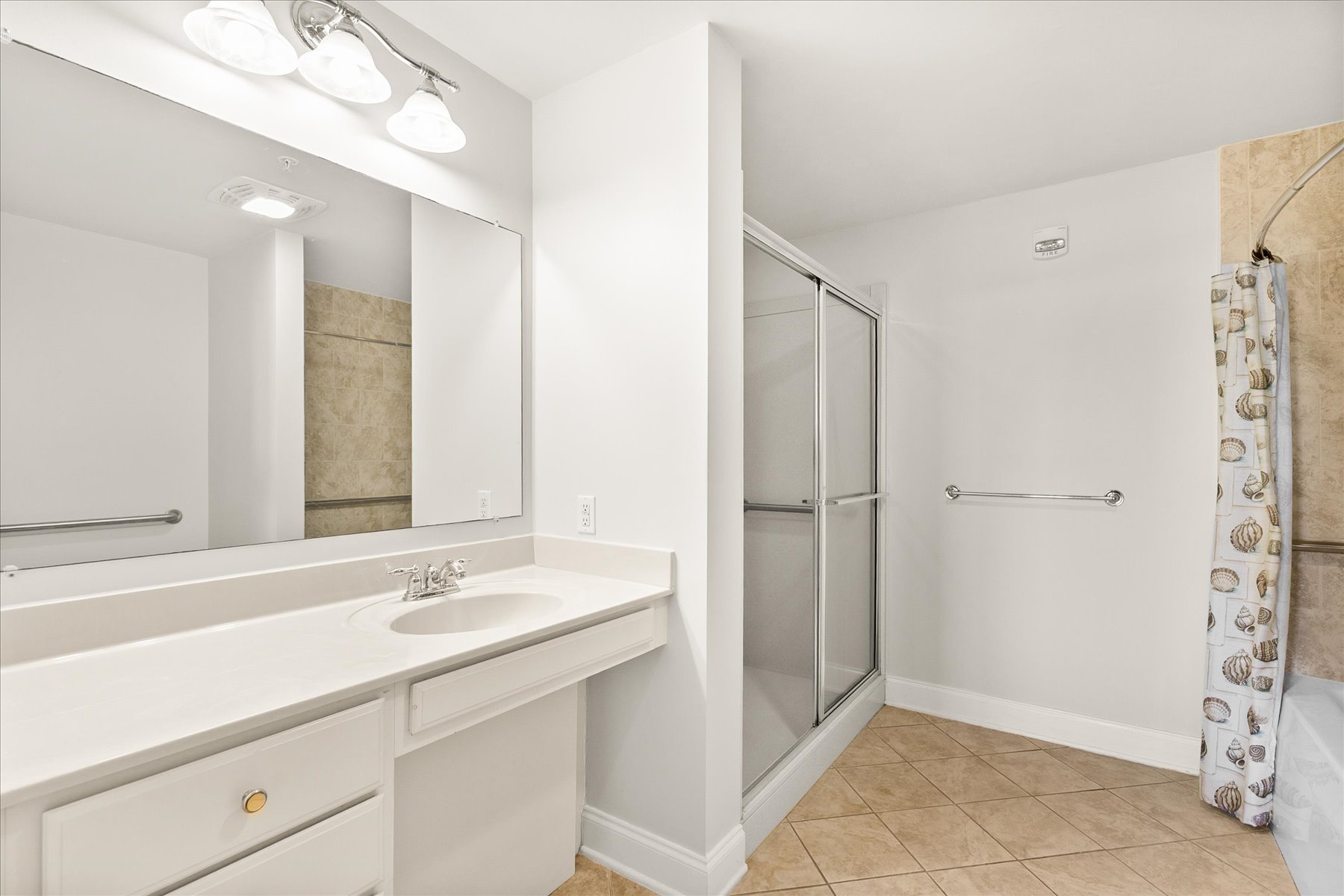 Primary Bath with Walk-In Shower & separate bathtub.