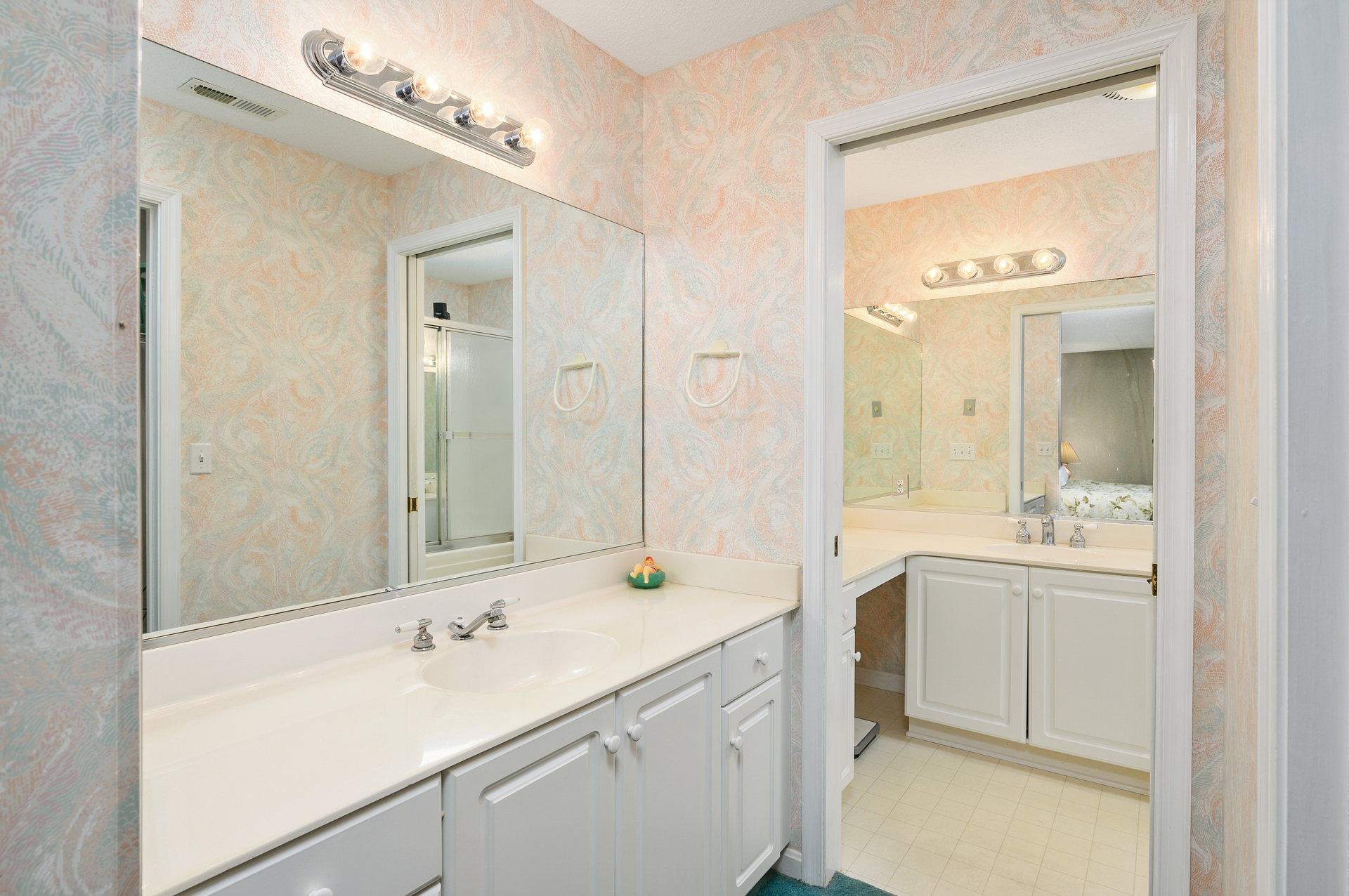 This spa like Primary Bath has got you covered with plenty of counter space