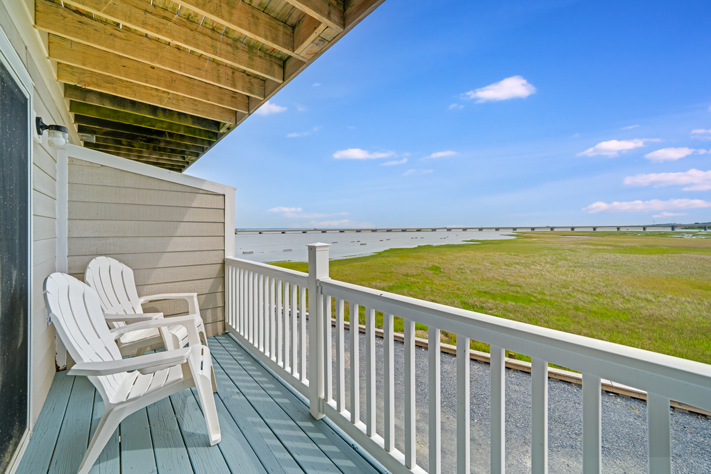Breathtaking Views of the Bay, Oyster Beds, and Chincoteague Causeway in the distance.