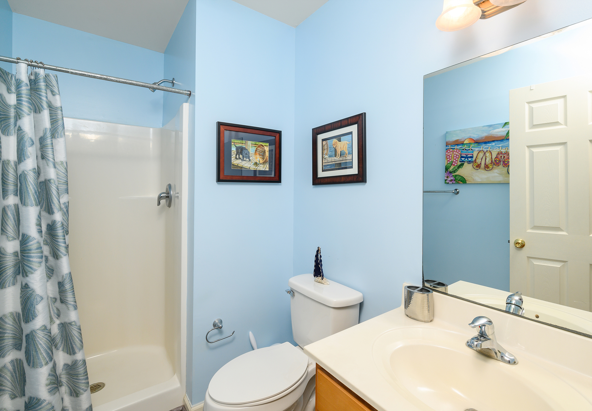 Full Bath 1 has a Walk-in Shower and is convenient to the Living Area and Bedrooms.