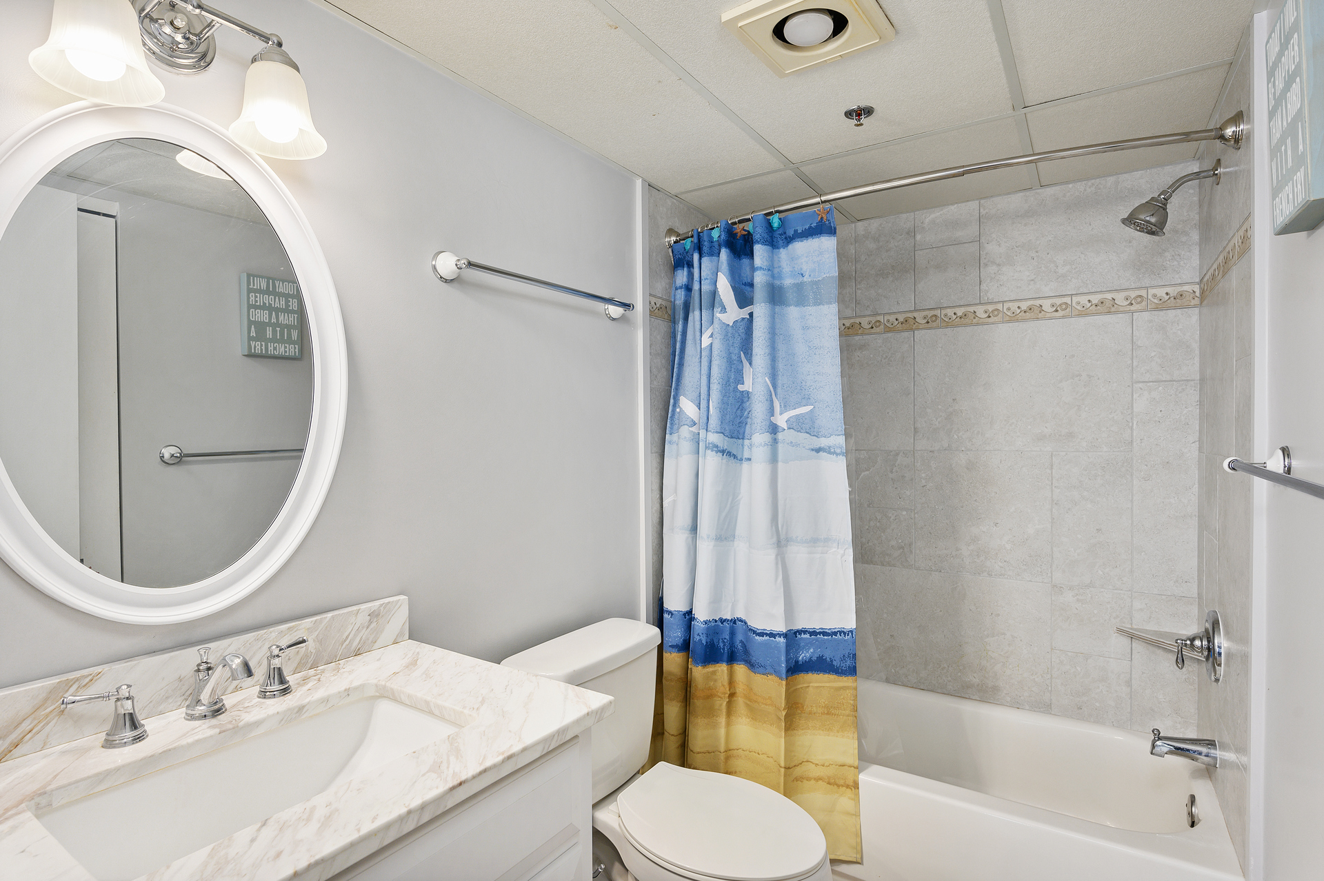 A second full bathroom with a shower/tub combo