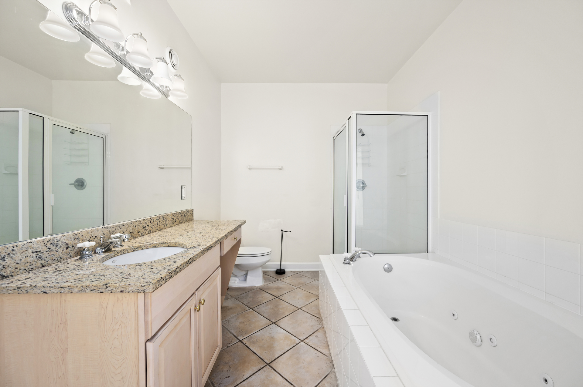 There is plenty of space in the large Primary Bath