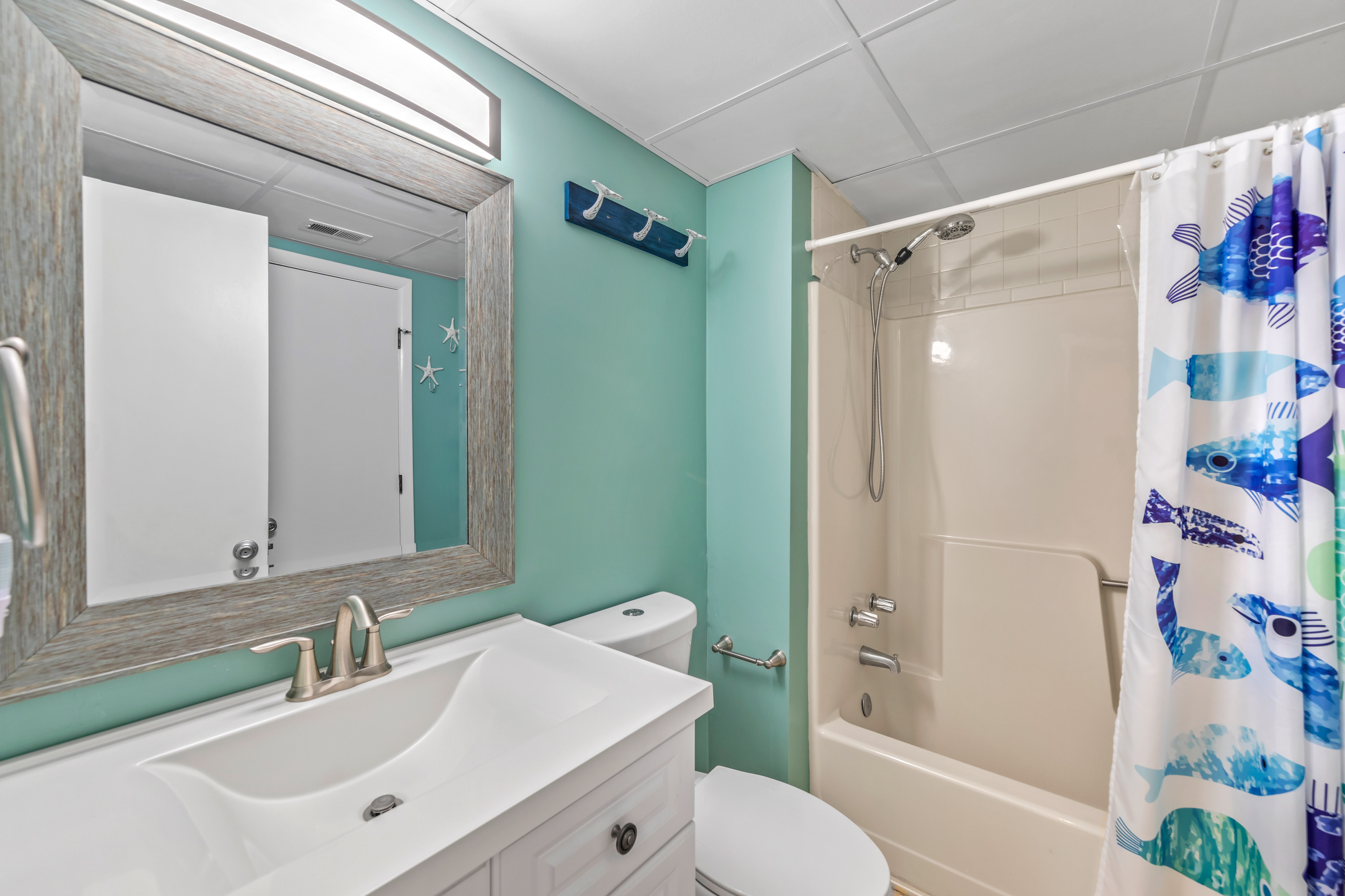 Full Hall Bath features a shower/tub combo.