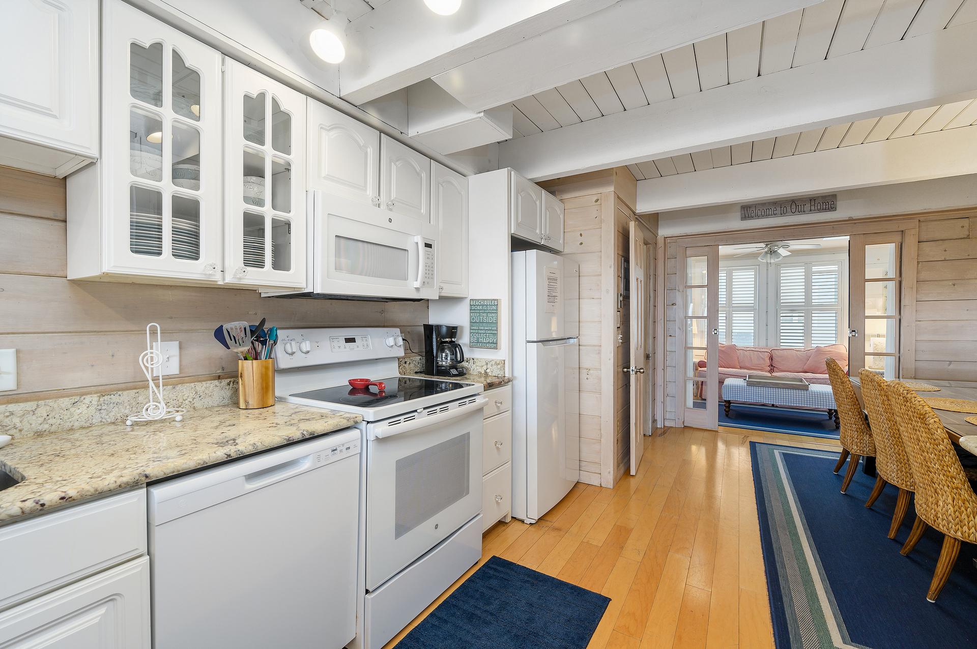 Stocked cabinets, gleaming granite counters...the Chef in the Family will love cooking in this Kitchen!