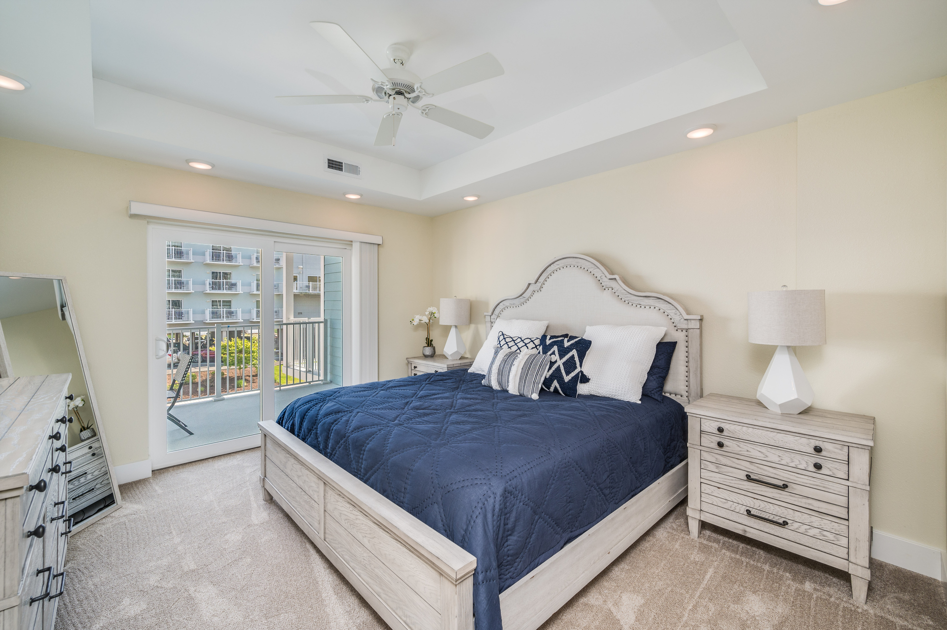 This Primary Bedroom has a King Bed & Amazing Balcony Views!