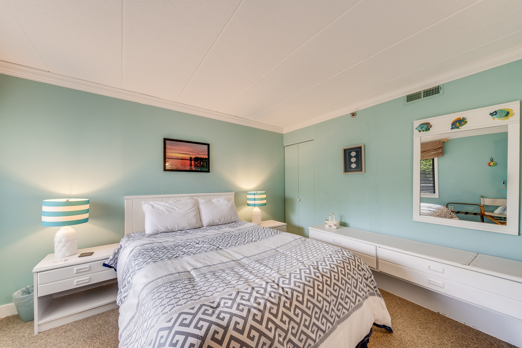 Bedroom 2 is adorned in Light & Beachy Blues.