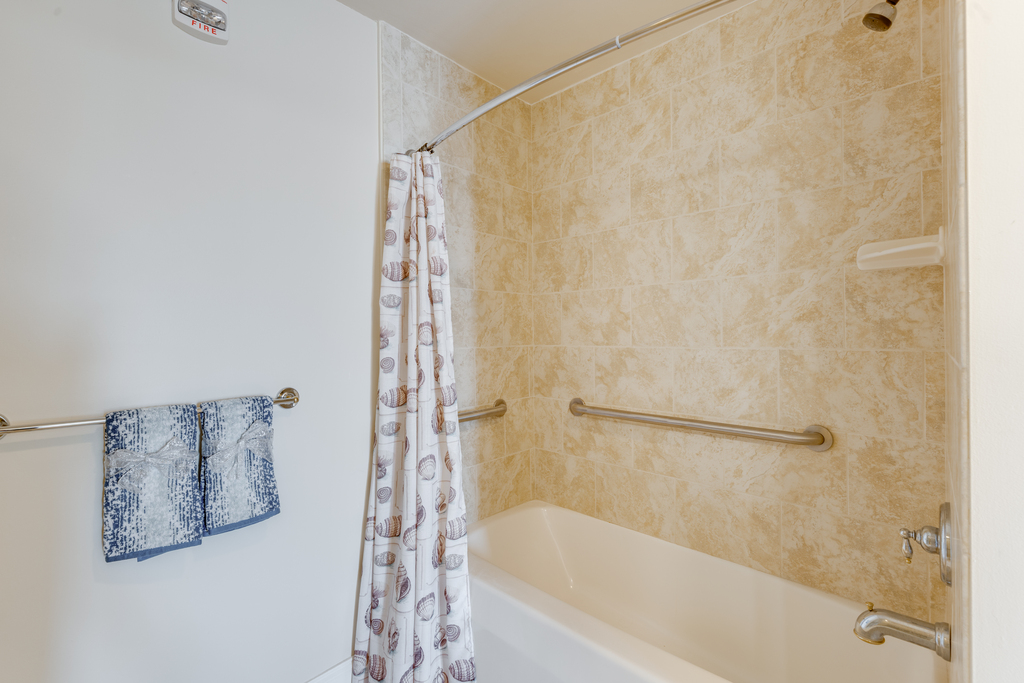 The Shower/Tub Combo in the Primary bath is also equipped with handrails