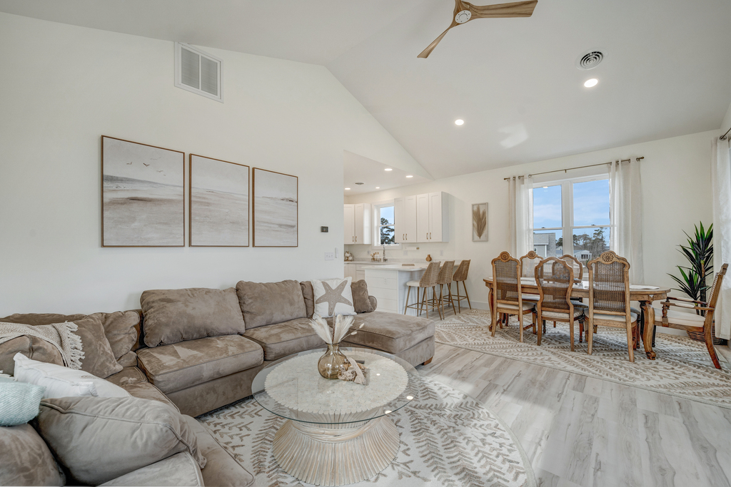 This gorgeous New Home has a Reverse Floor Plan to maximize gorgeous Water Views.