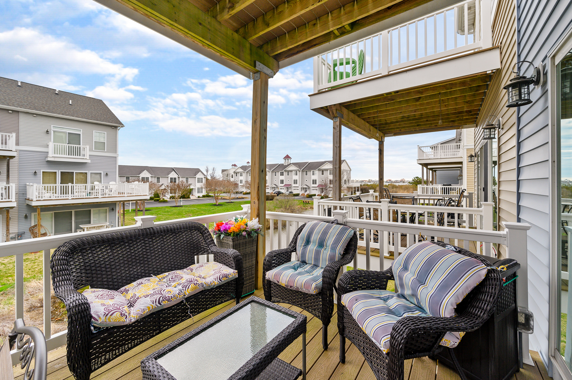 Get some fresh air on this cozy deck with plenty of seating for the entire family