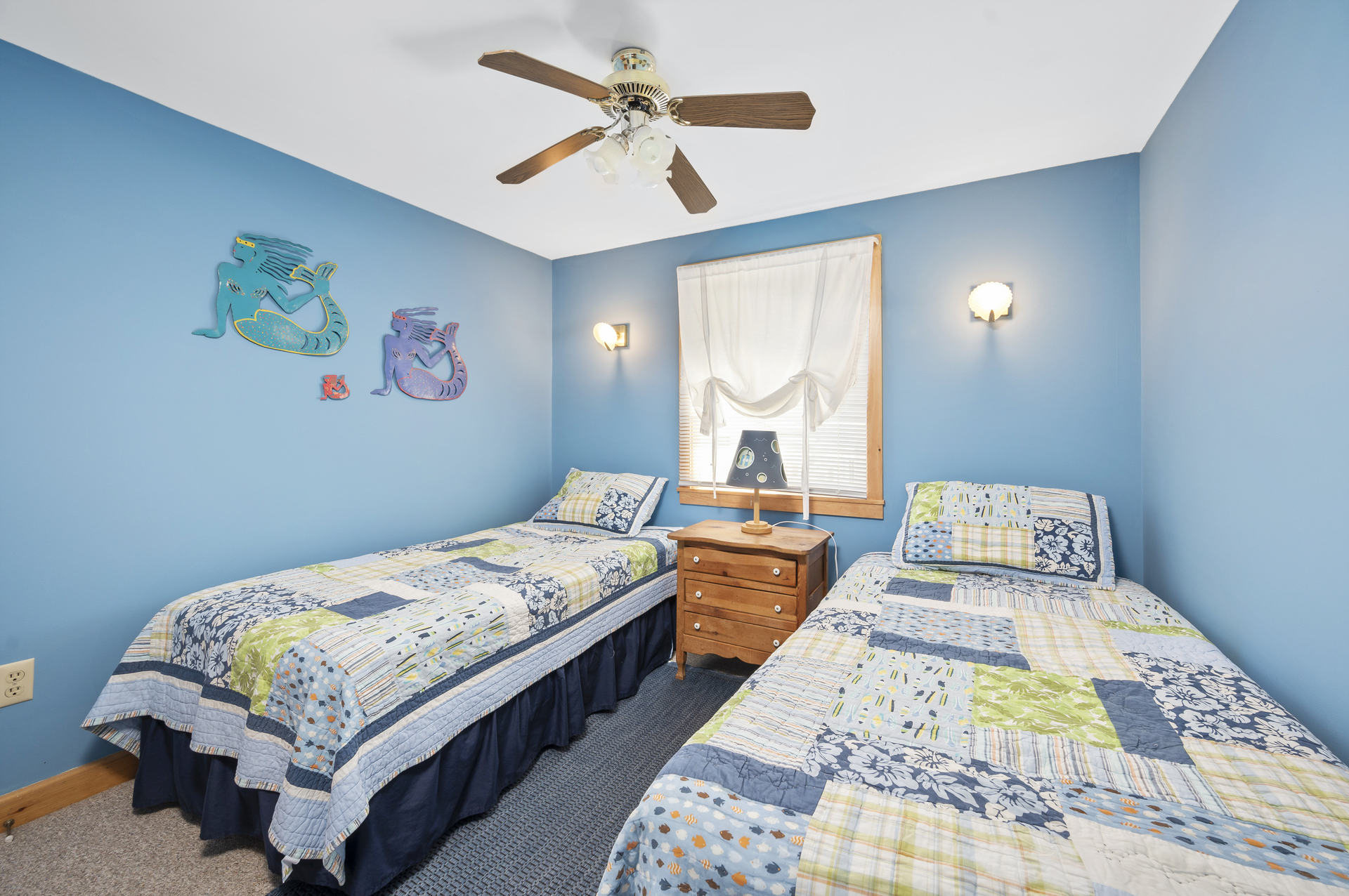 Bedroom 1 has Fresh Paint and 2 Twin Beds.