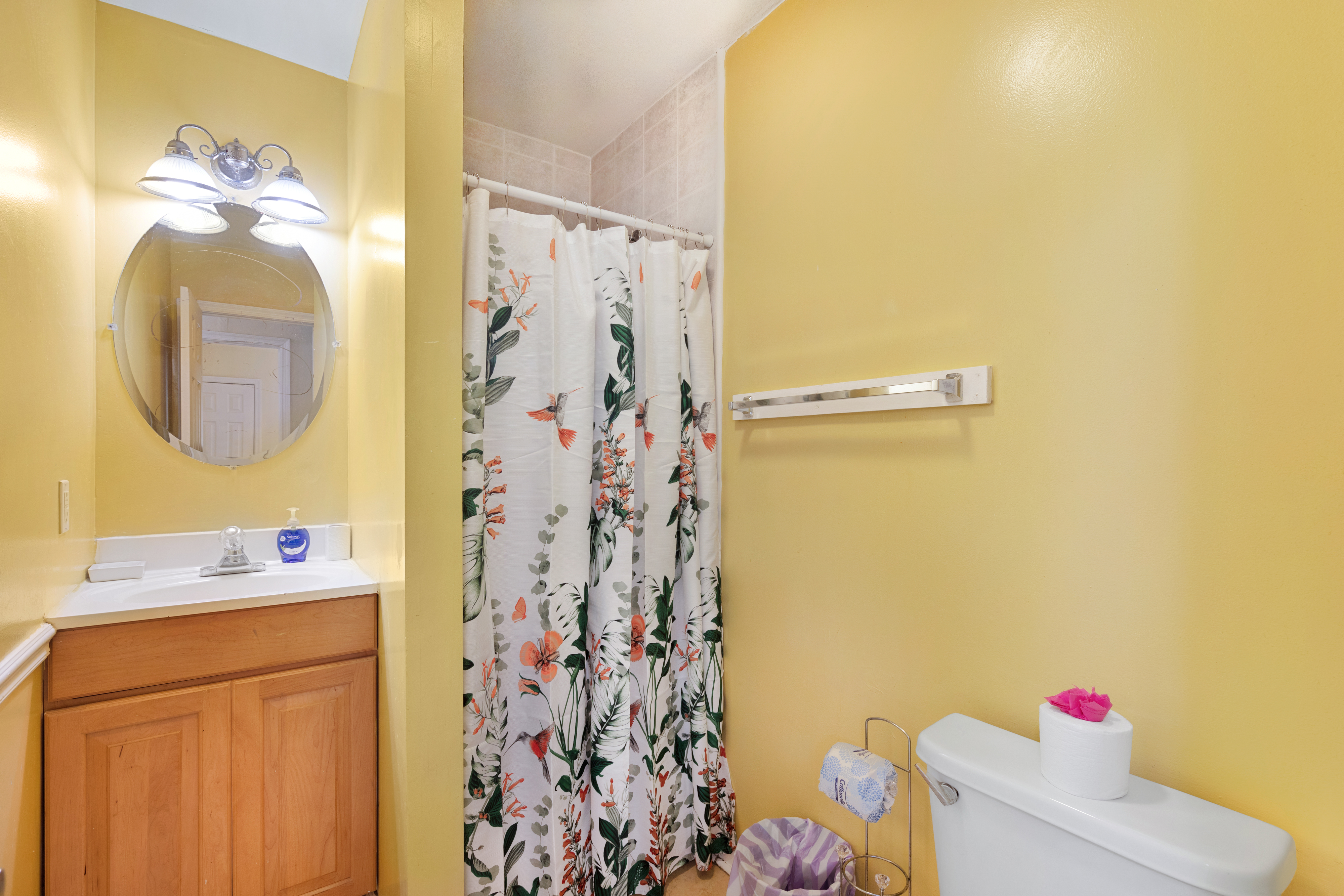 Full size shared bath with walk-in shower.