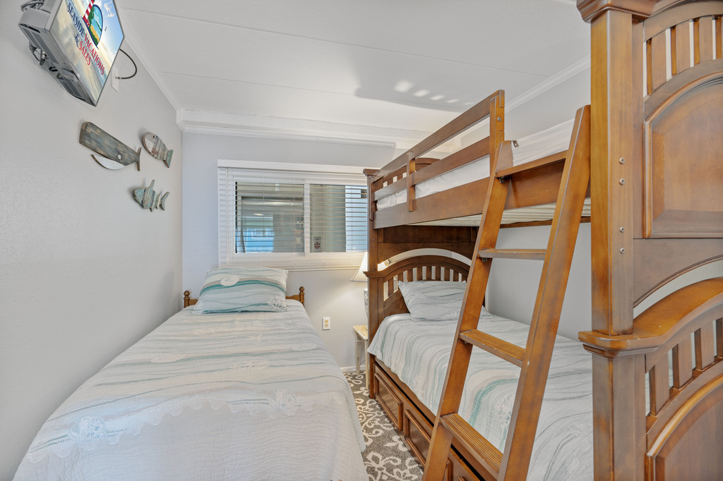 This cozy second bedroom now has a bunk bed, making it perfect for the kids!