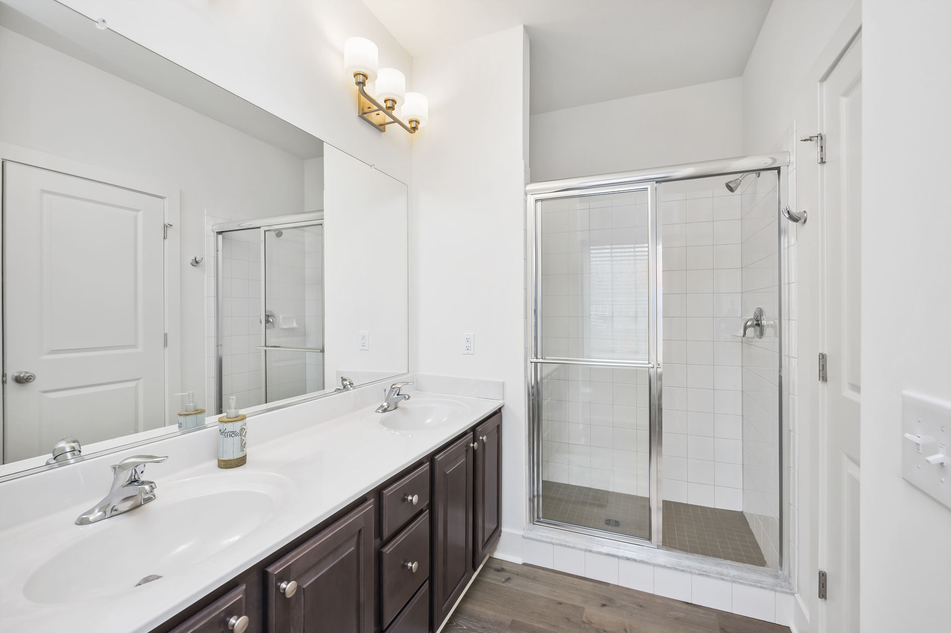 Luxurious Master Bath has Double Vanity and Walk-in Shower.