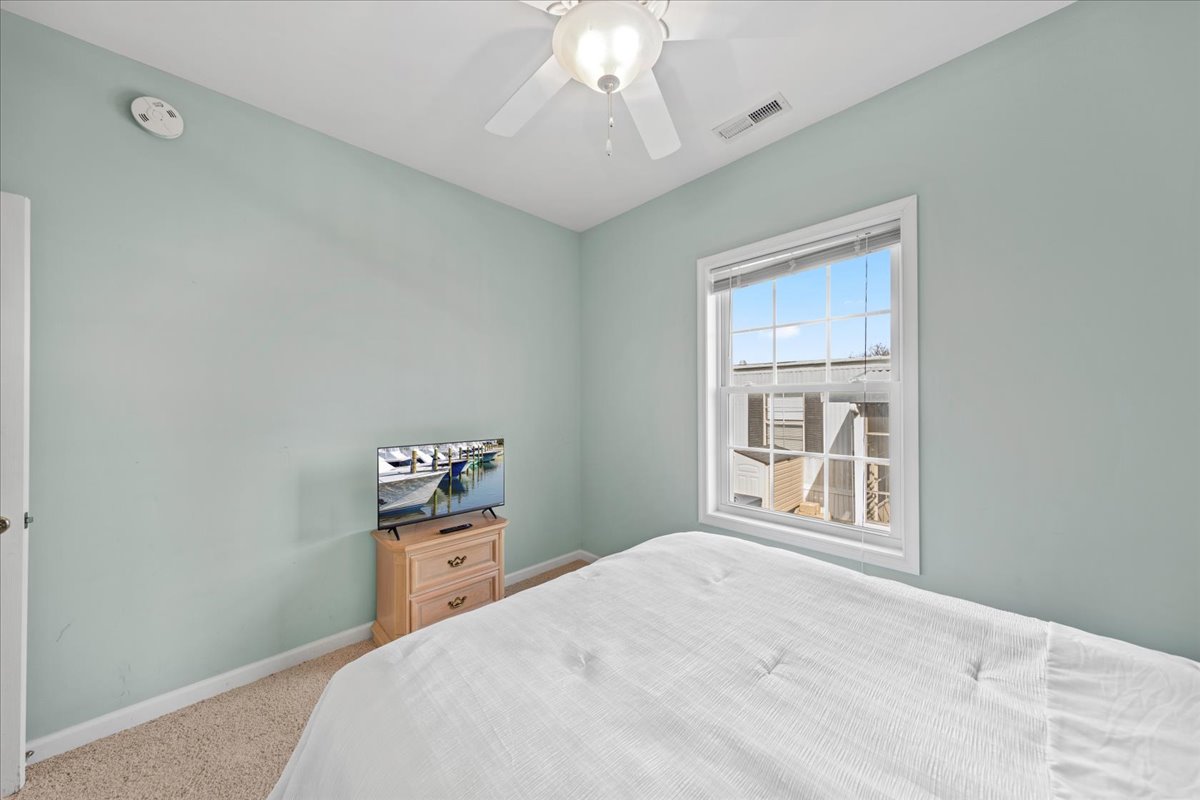 Sink into the Cozy Queen Bed & enjoy the Flat Screen TV.