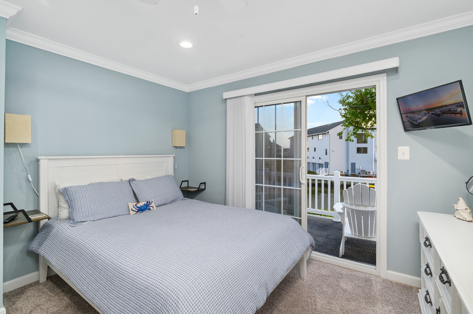 Slip out on the balcony and watch the moon dance over the water.