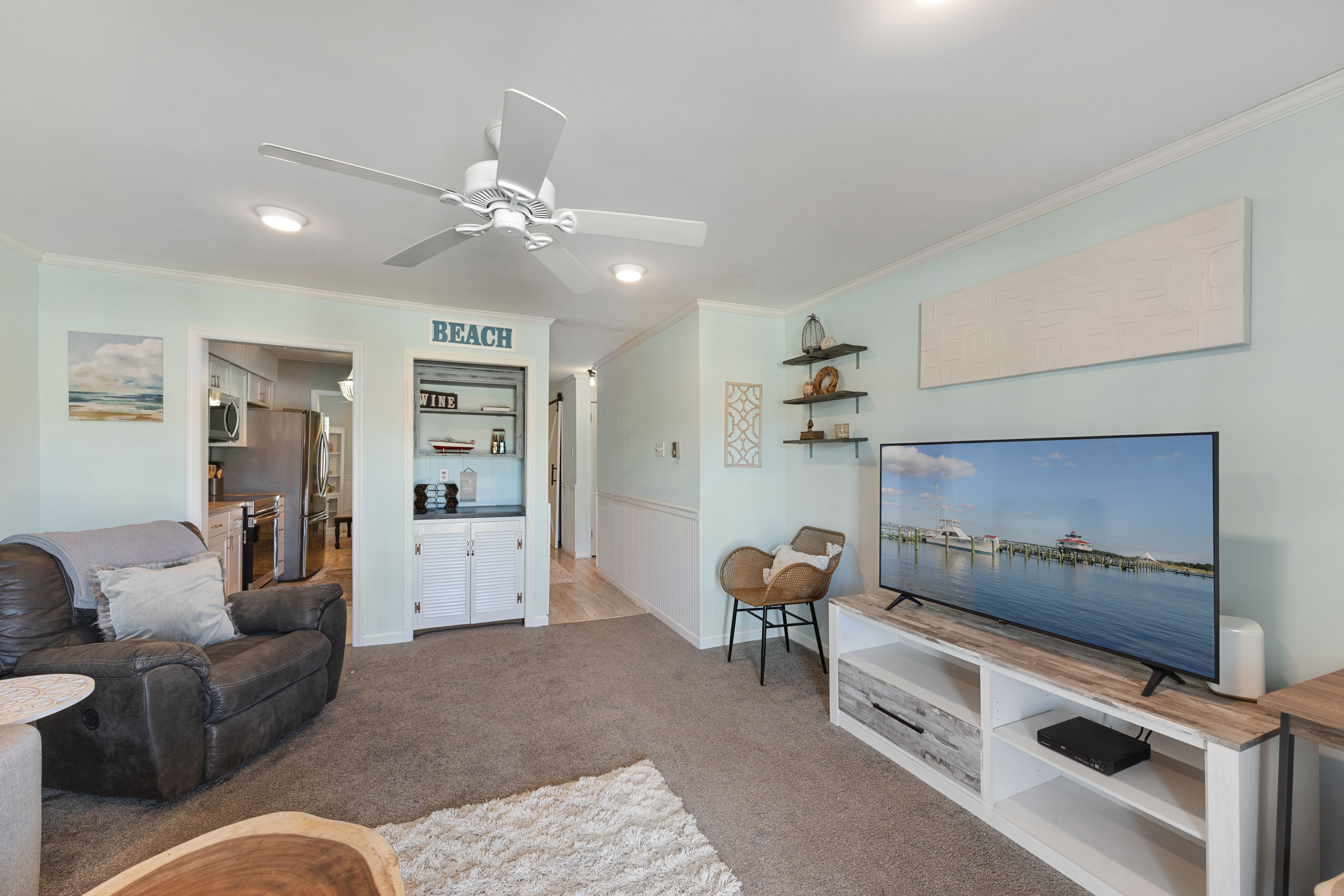 Gather with the family for movie night on the flat screen.