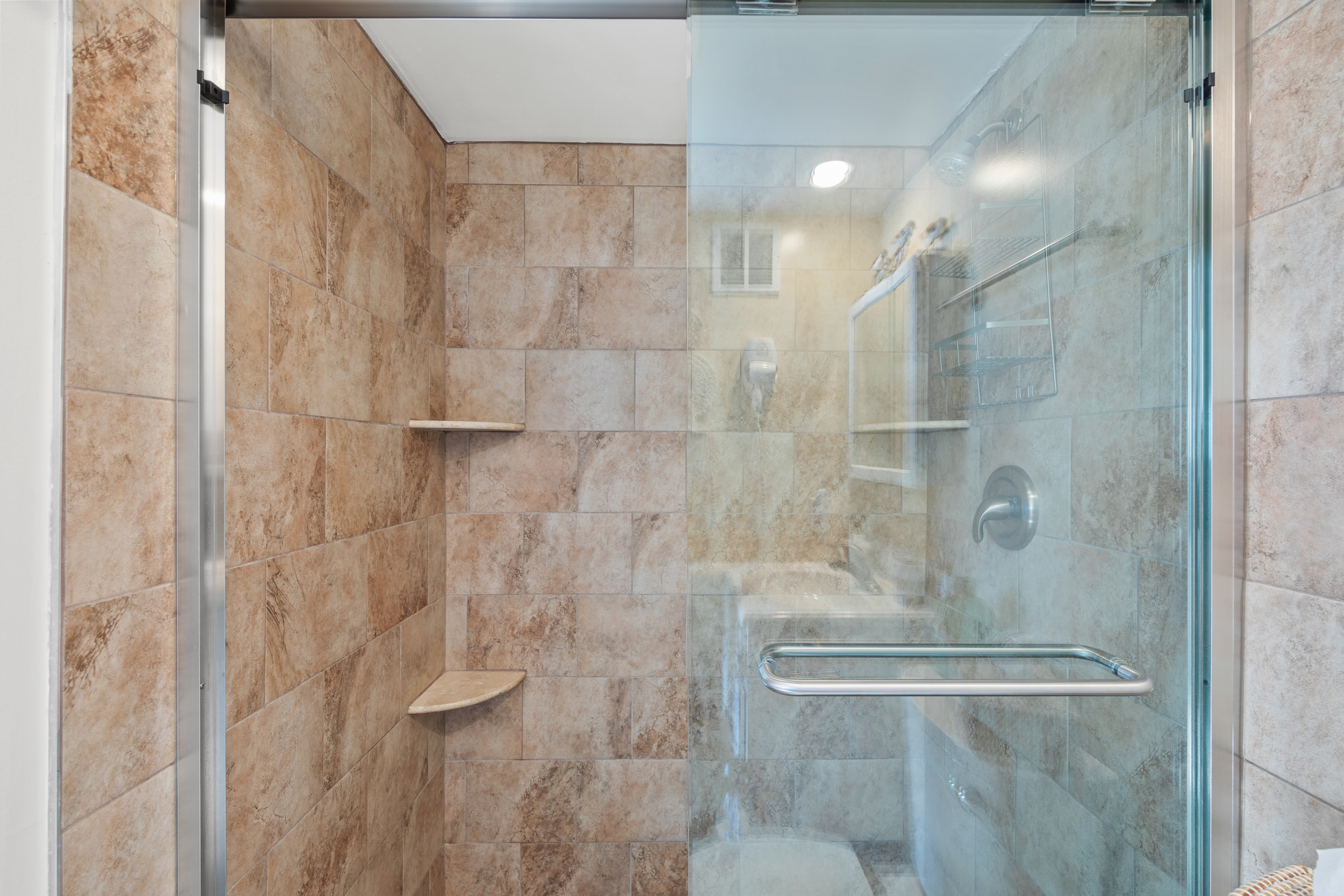 It even has a newly renovated Walk-In Shower!