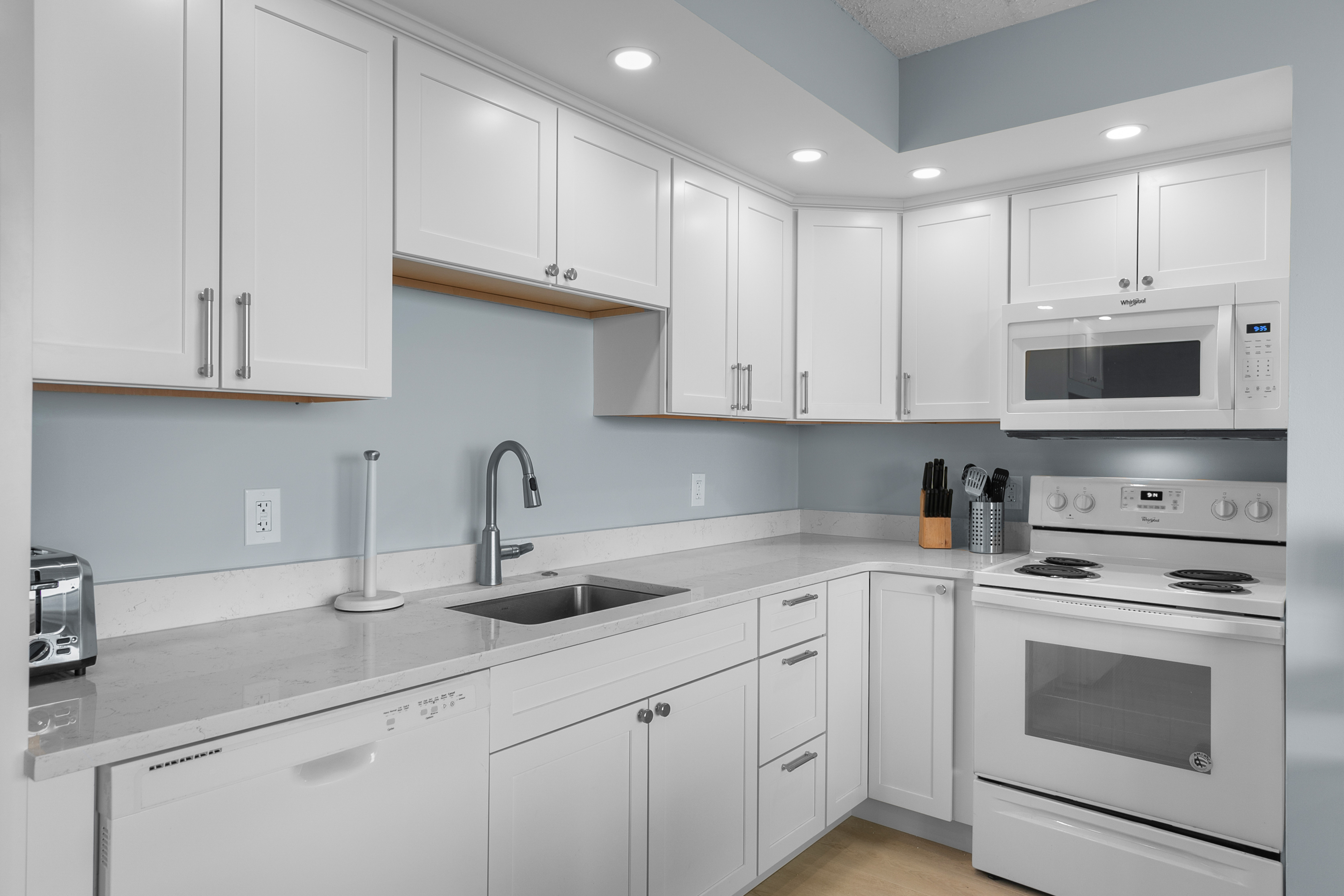 The Open Kitchen & Living Areas allow the Chef in your Family to never miss out on a bit of Family Fun.