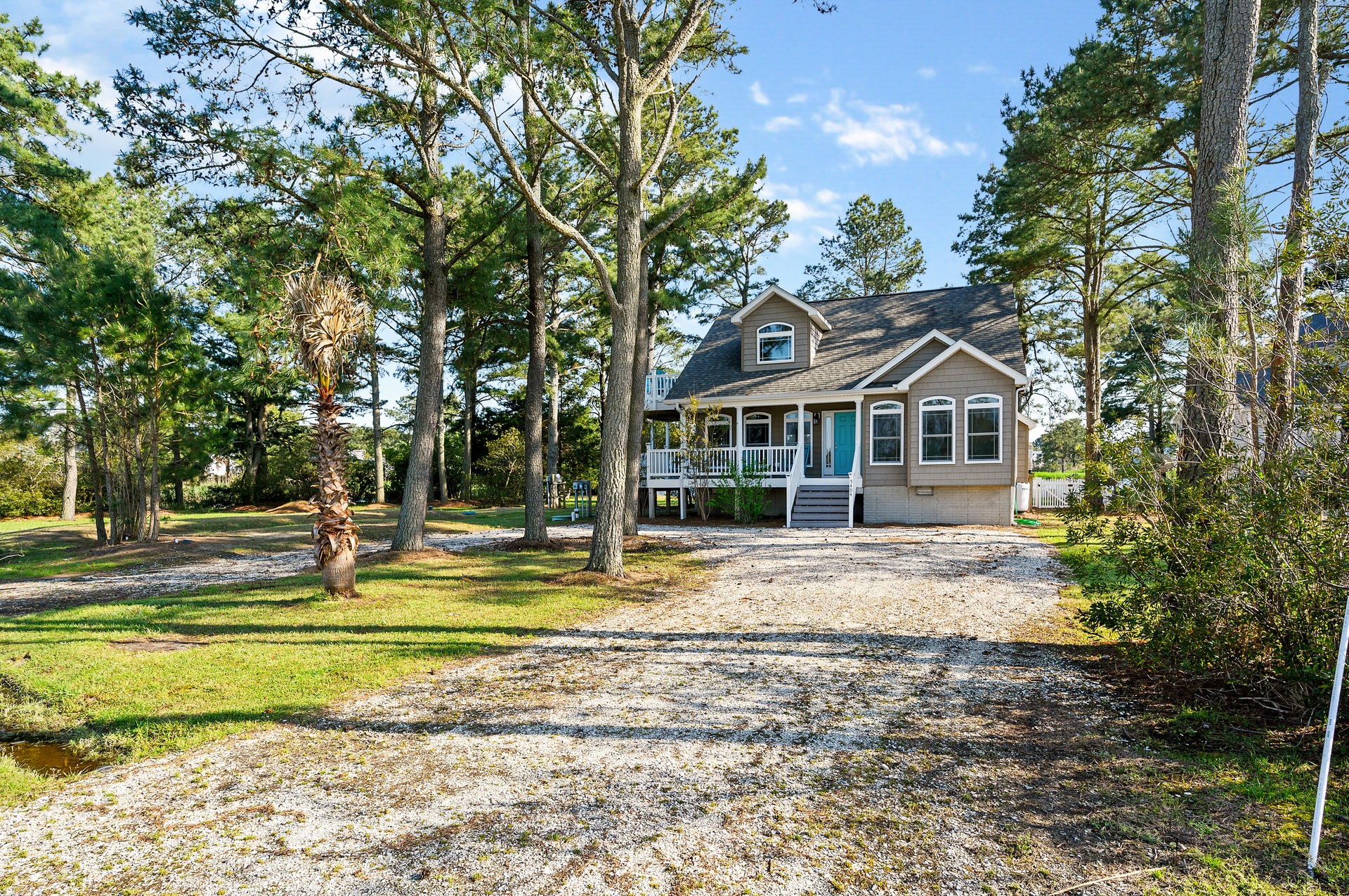 Huge Driveway with plenty of parking for cars and even your Boat.
