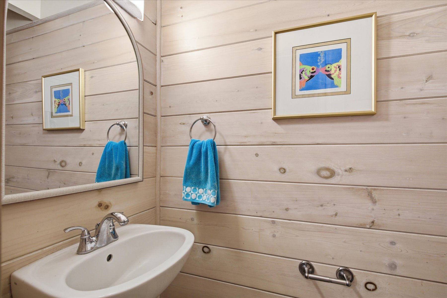 There is a 1/2 bath on the lower level.