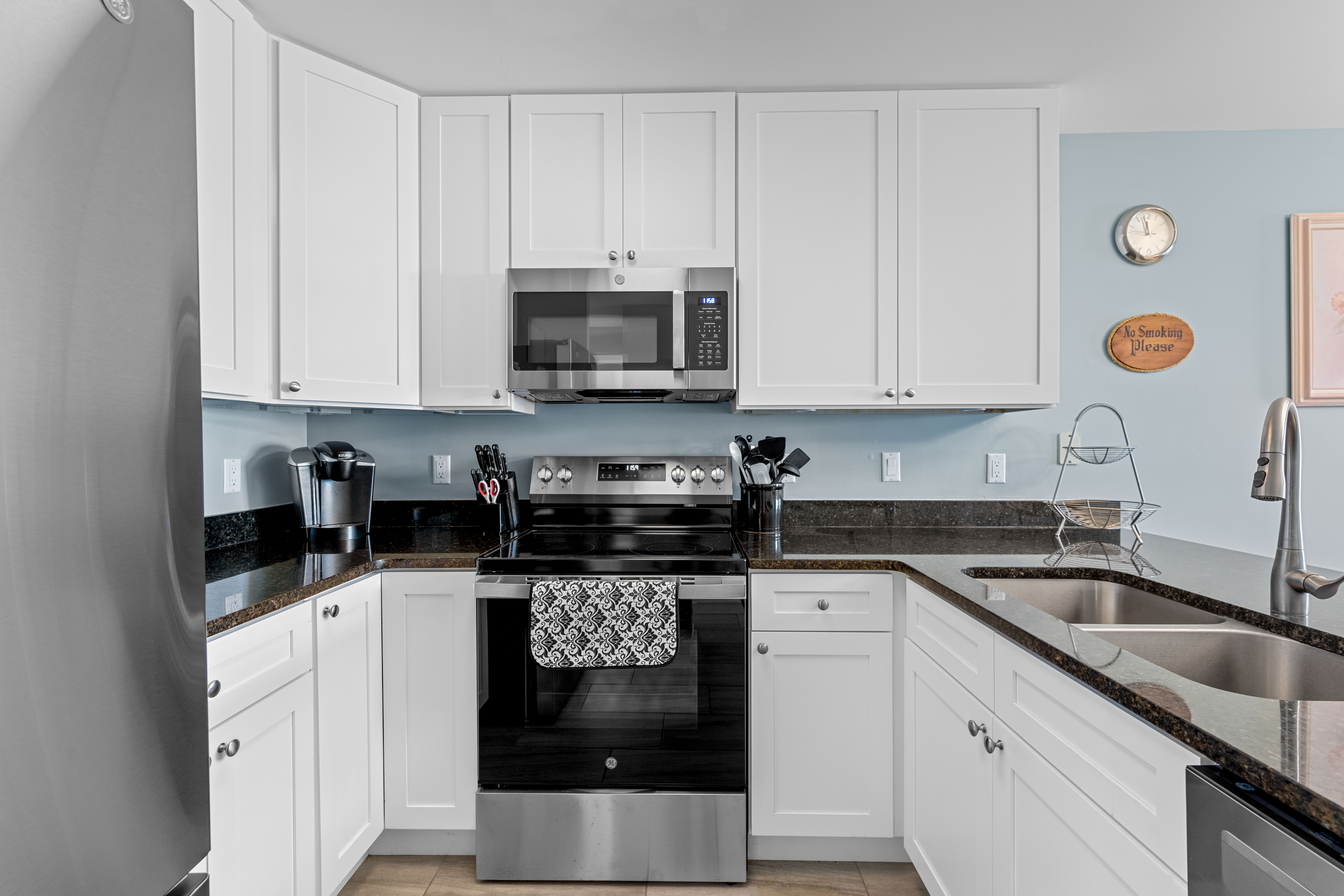 Beautiful beachy white cabinetry.