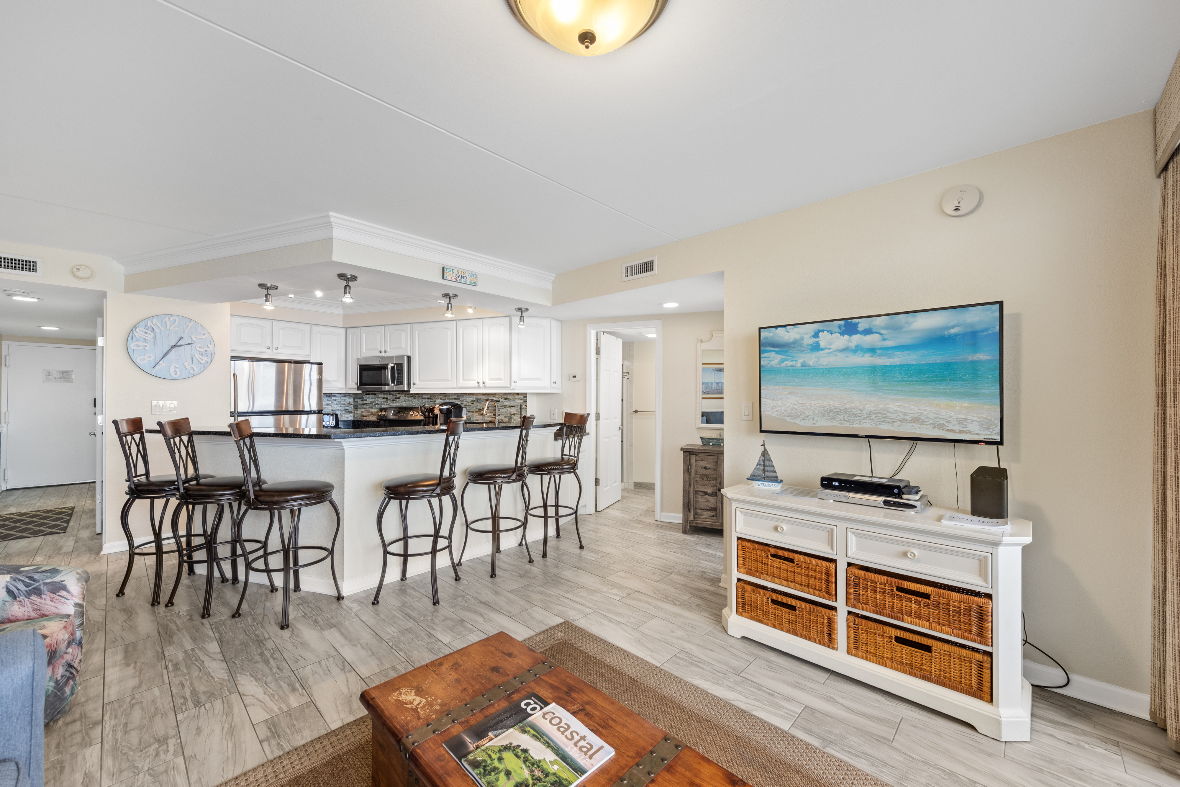 Kick back and relax with the family and watch a movie together on the flat screen.