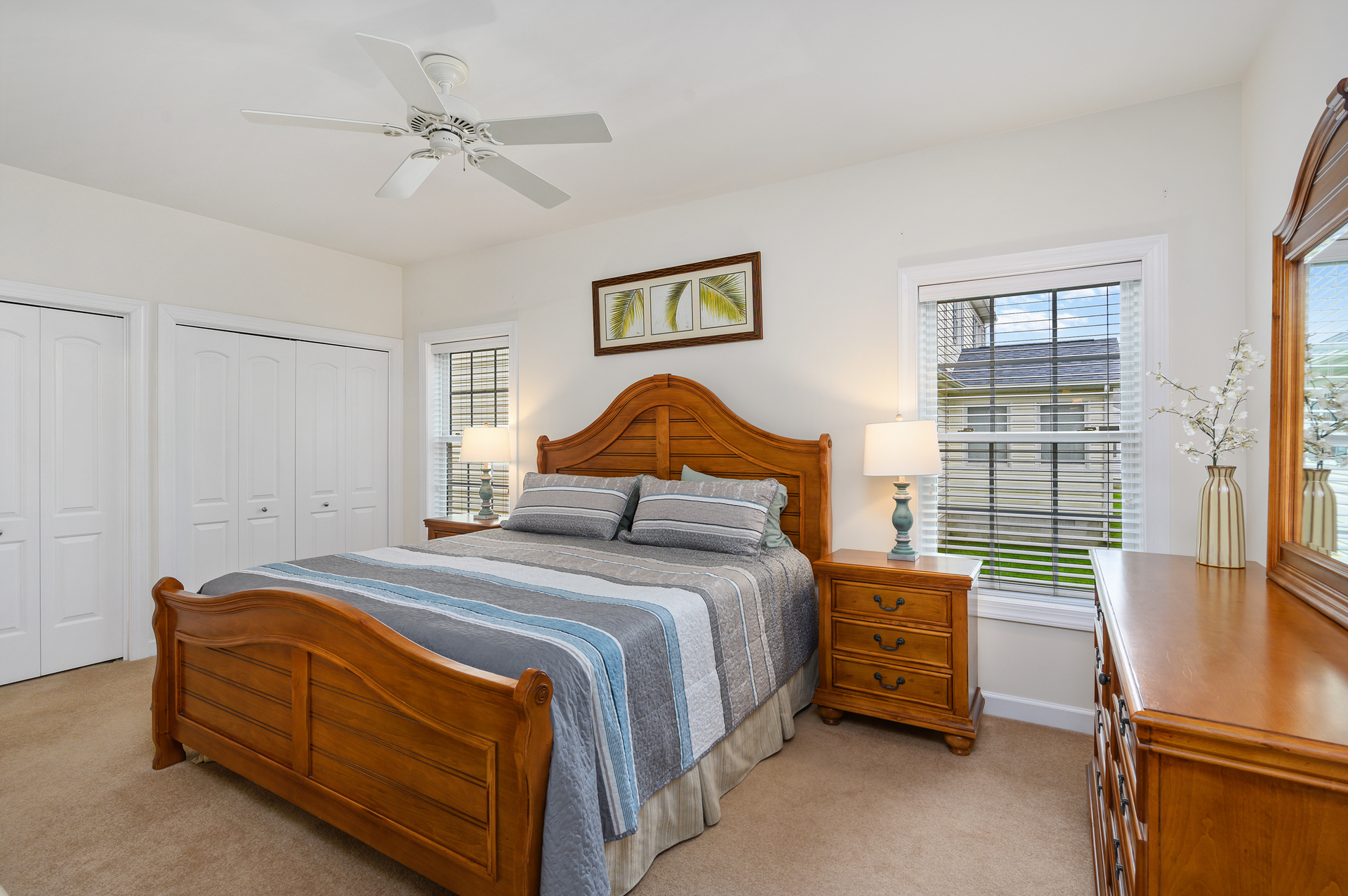 The 1st floor Primary Bedroom's plush King bed