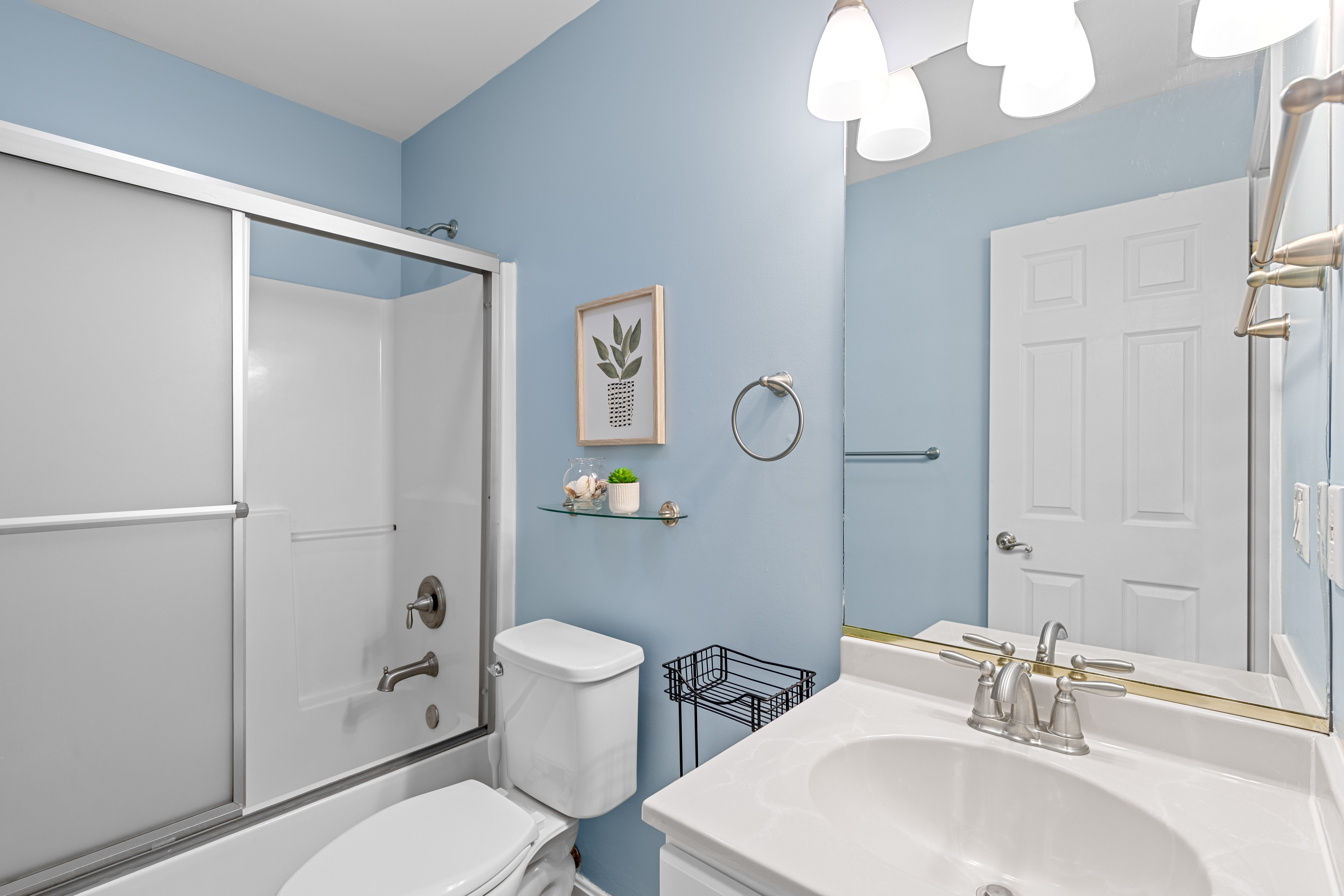 The Shared Bath has another Shower/Tub Combo