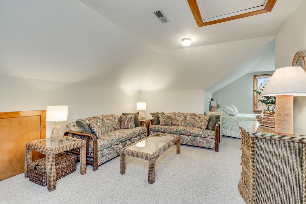There is an additional Living Area upstairs with Flat Screen TV and comfy furnishings.