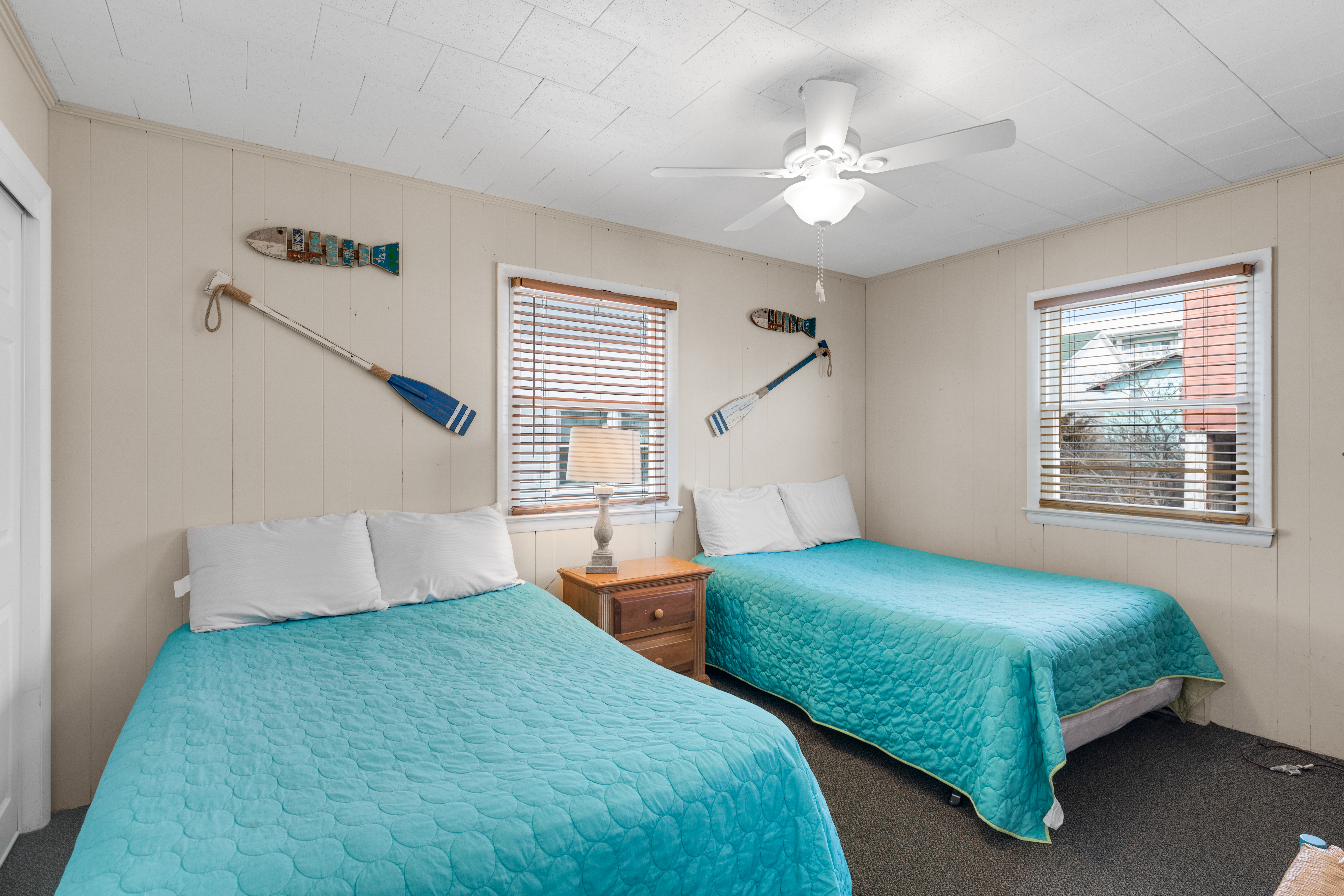 Bedroom 2 across the hall sleeps 4 with 2 Double Beds!